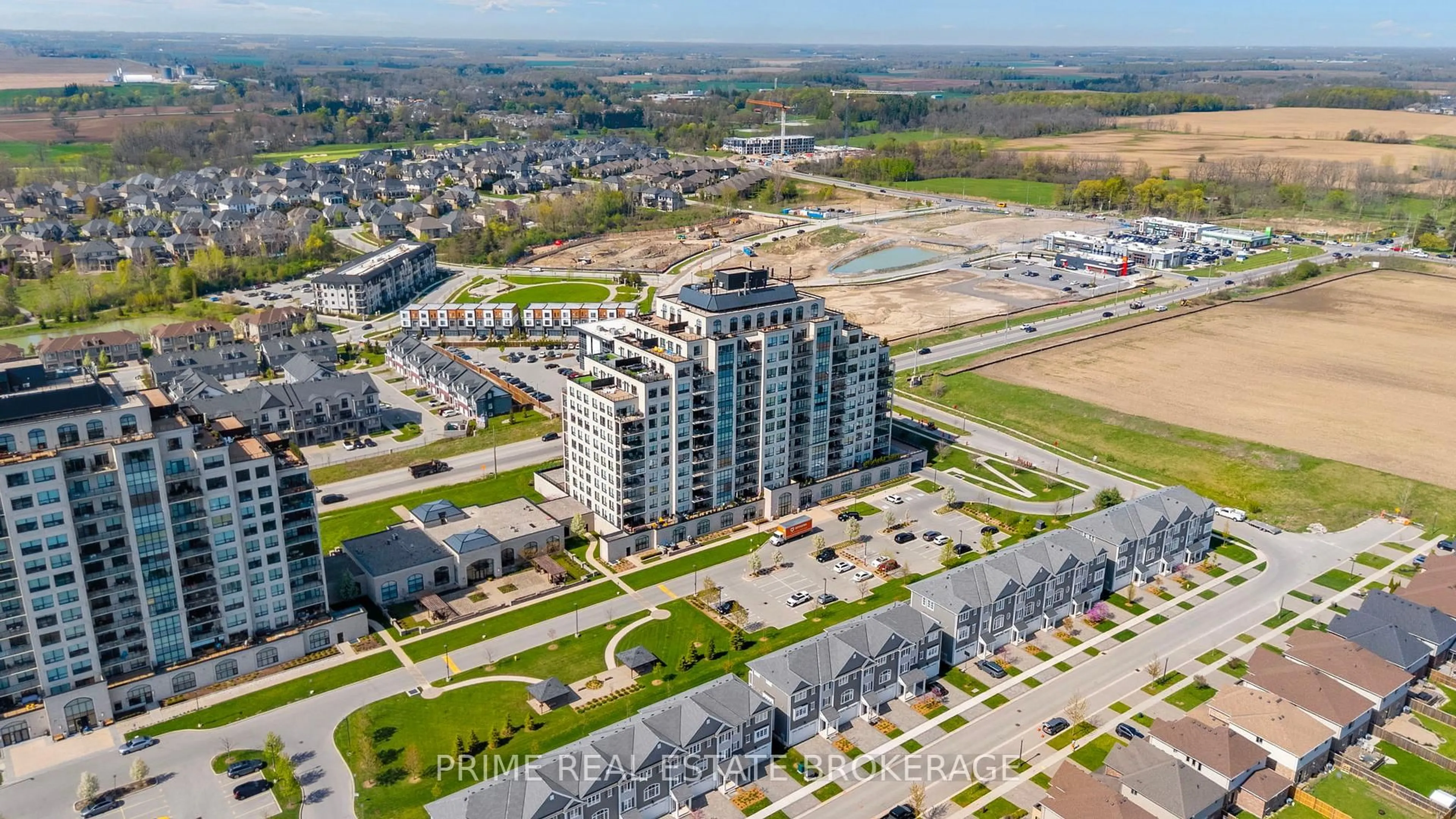 A pic from outside/outdoor area/front of a property/back of a property/a pic from drone, unknown for 240 Village Walk Blvd #514, London North Ontario N6G 0P6