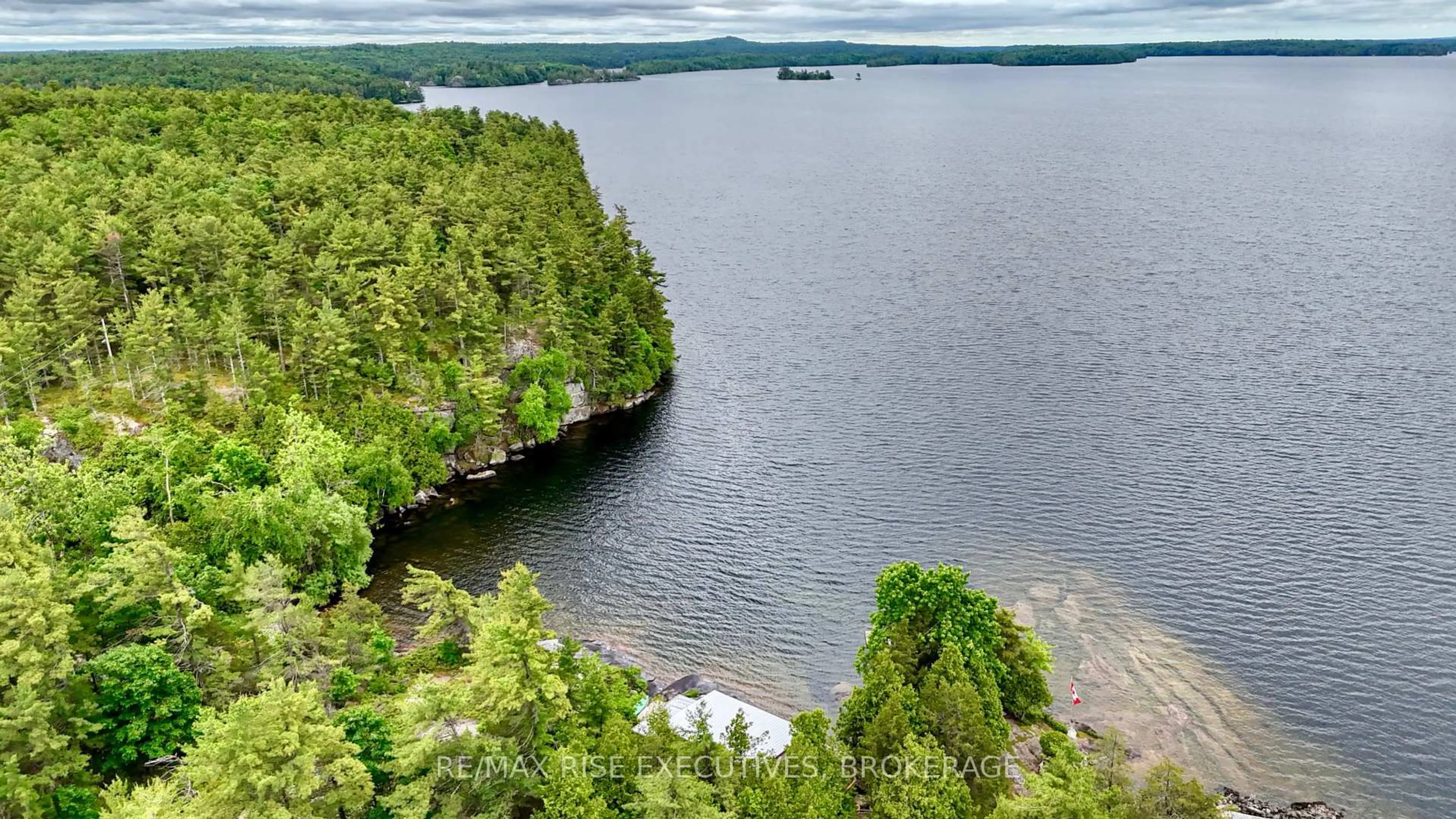 A pic from outside/outdoor area/front of a property/back of a property/a pic from drone, water/lake/river/ocean view for 128 Big Waters Lane, Athens Ontario K0E 1B0