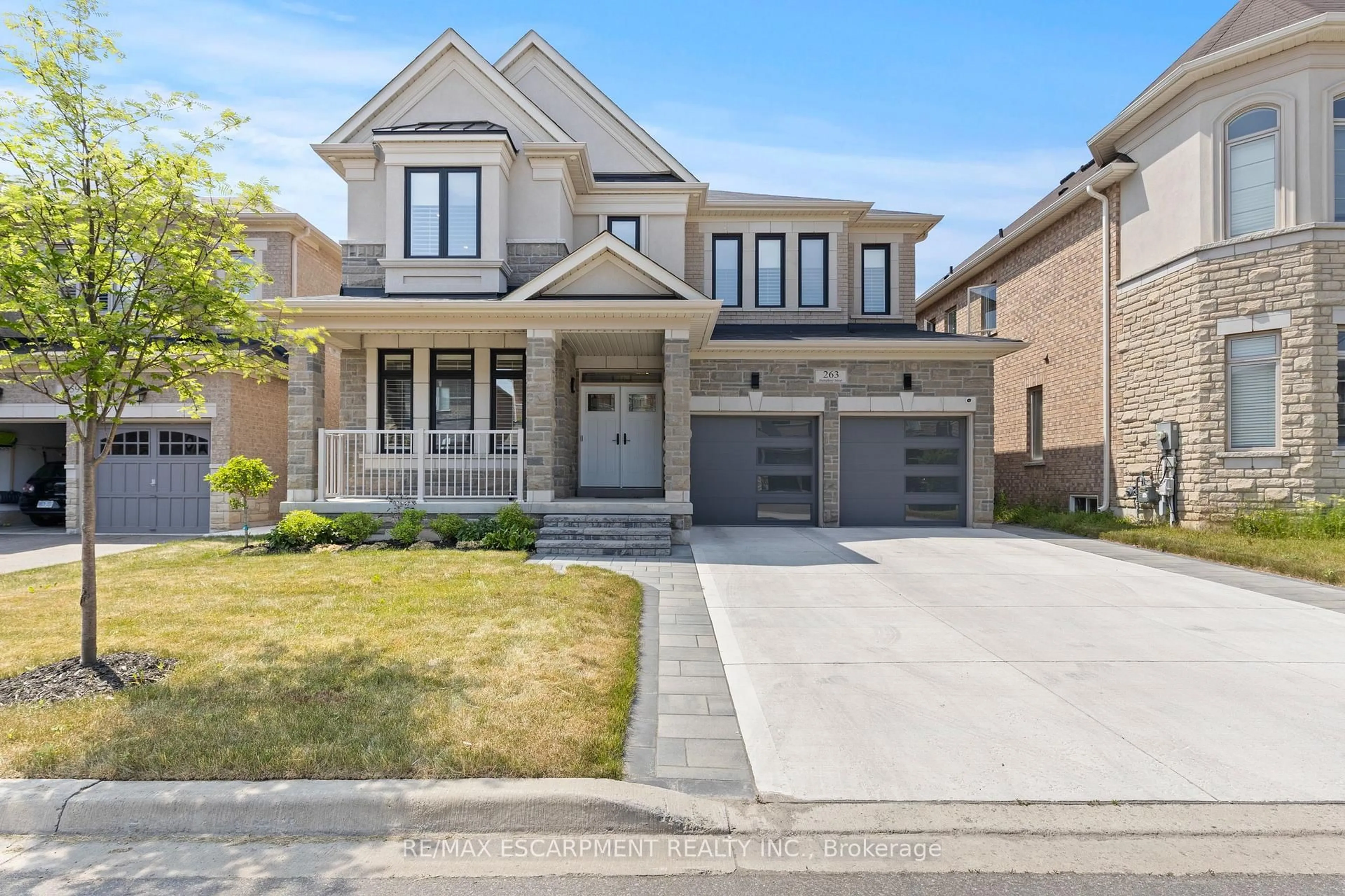 Home with brick exterior material, street for 263 Humphrey St, Hamilton Ontario L8B 1X4