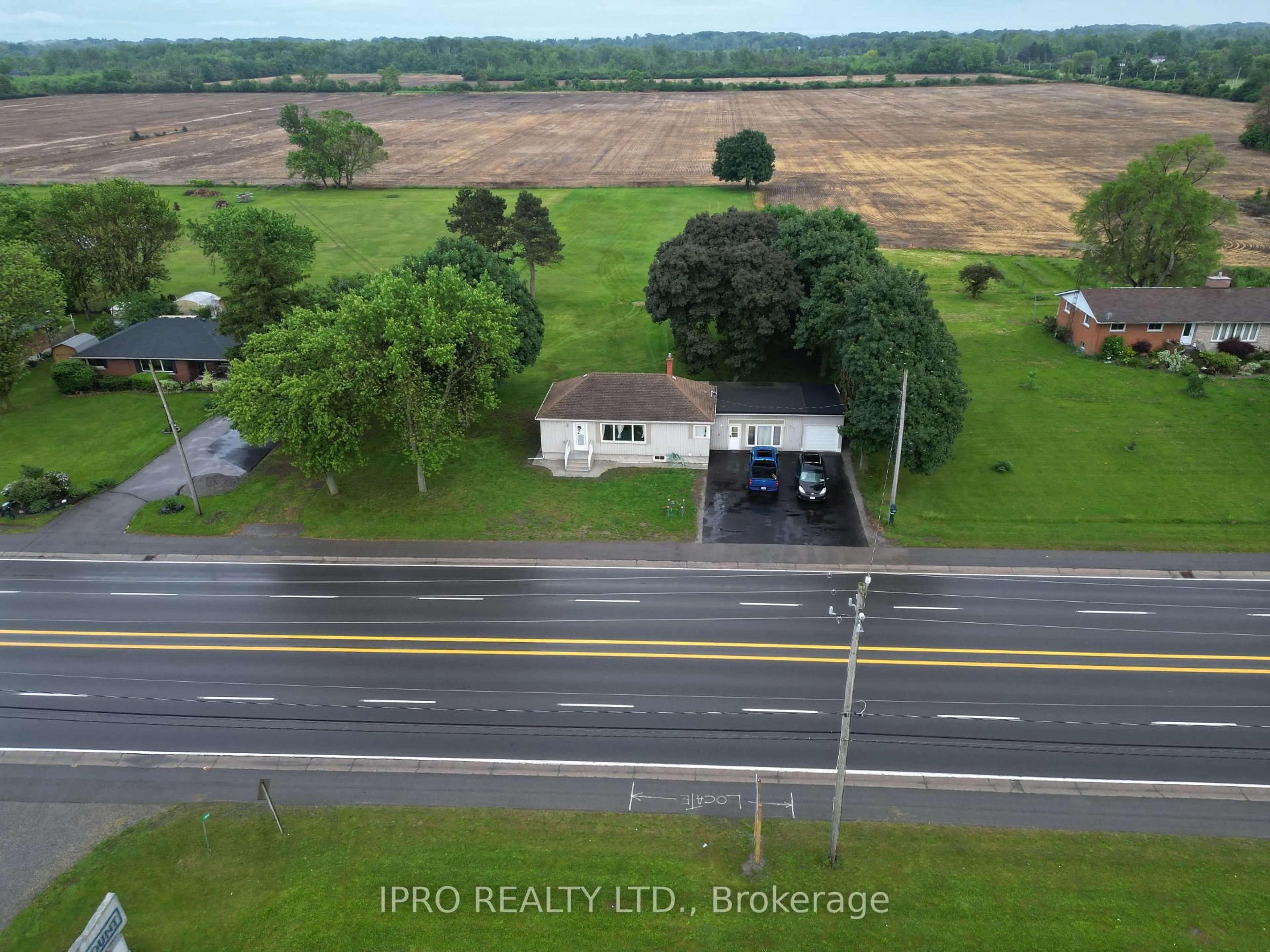 A pic from outside/outdoor area/front of a property/back of a property/a pic from drone, water/lake/river/ocean view for 3097 Hwy 3 Highway, Port Colborne Ontario L3K 5V3