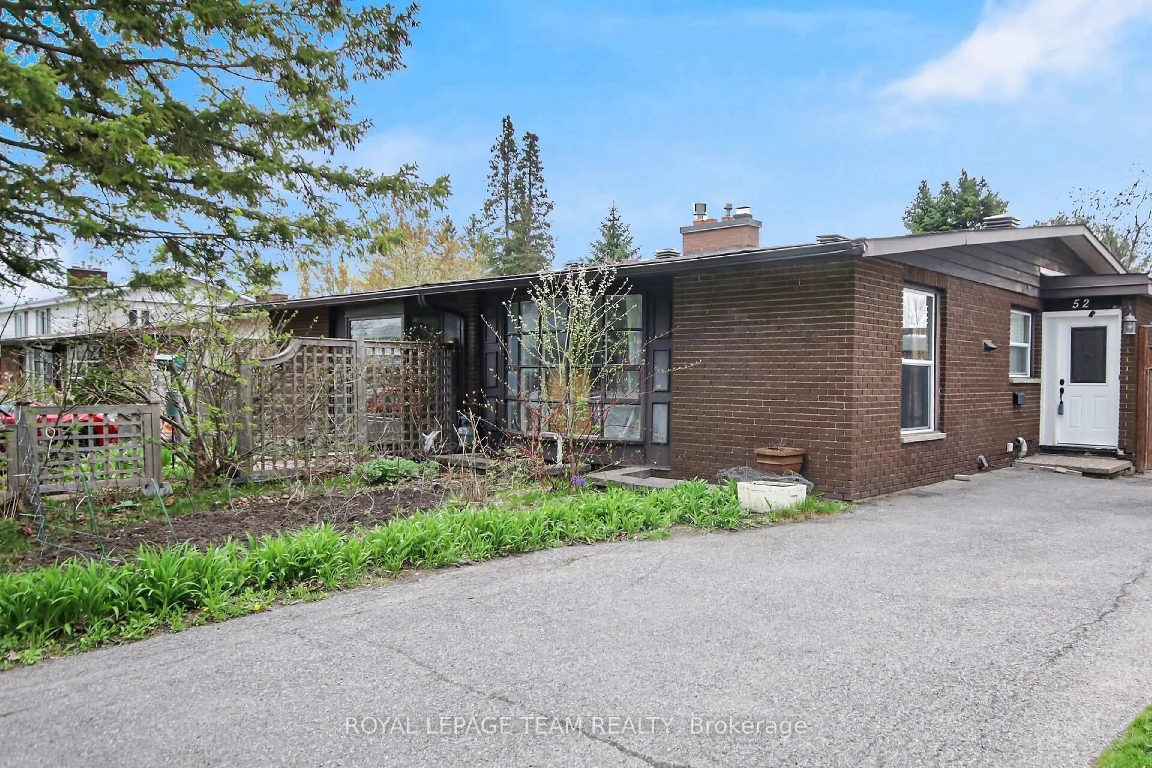 Home with brick exterior material, street for 52 Bowhill Ave, Ottawa Ontario K2E 6S7