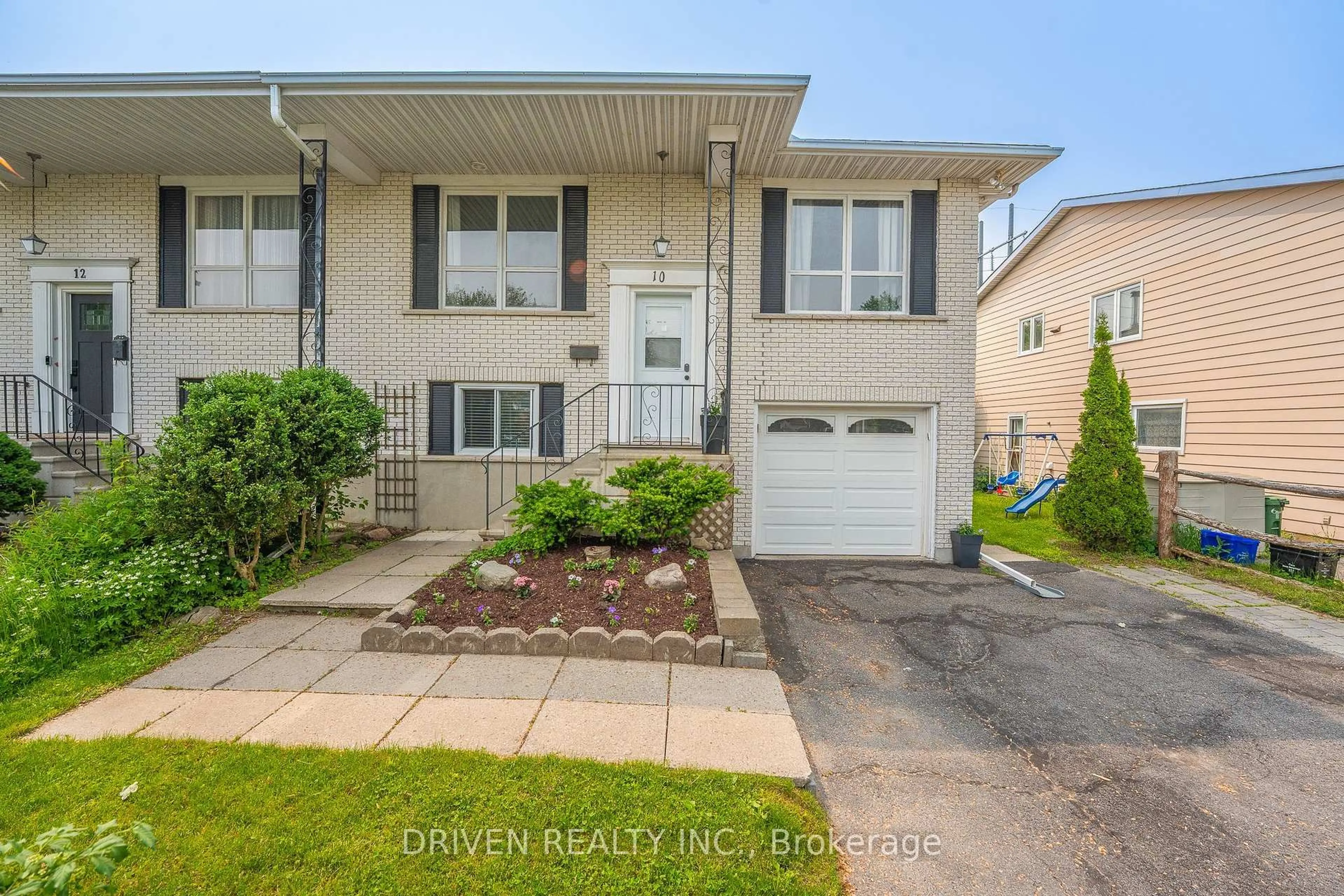 Home with vinyl exterior material, street for 10 Shoreham Ave, Ottawa Ontario K2G 3T7