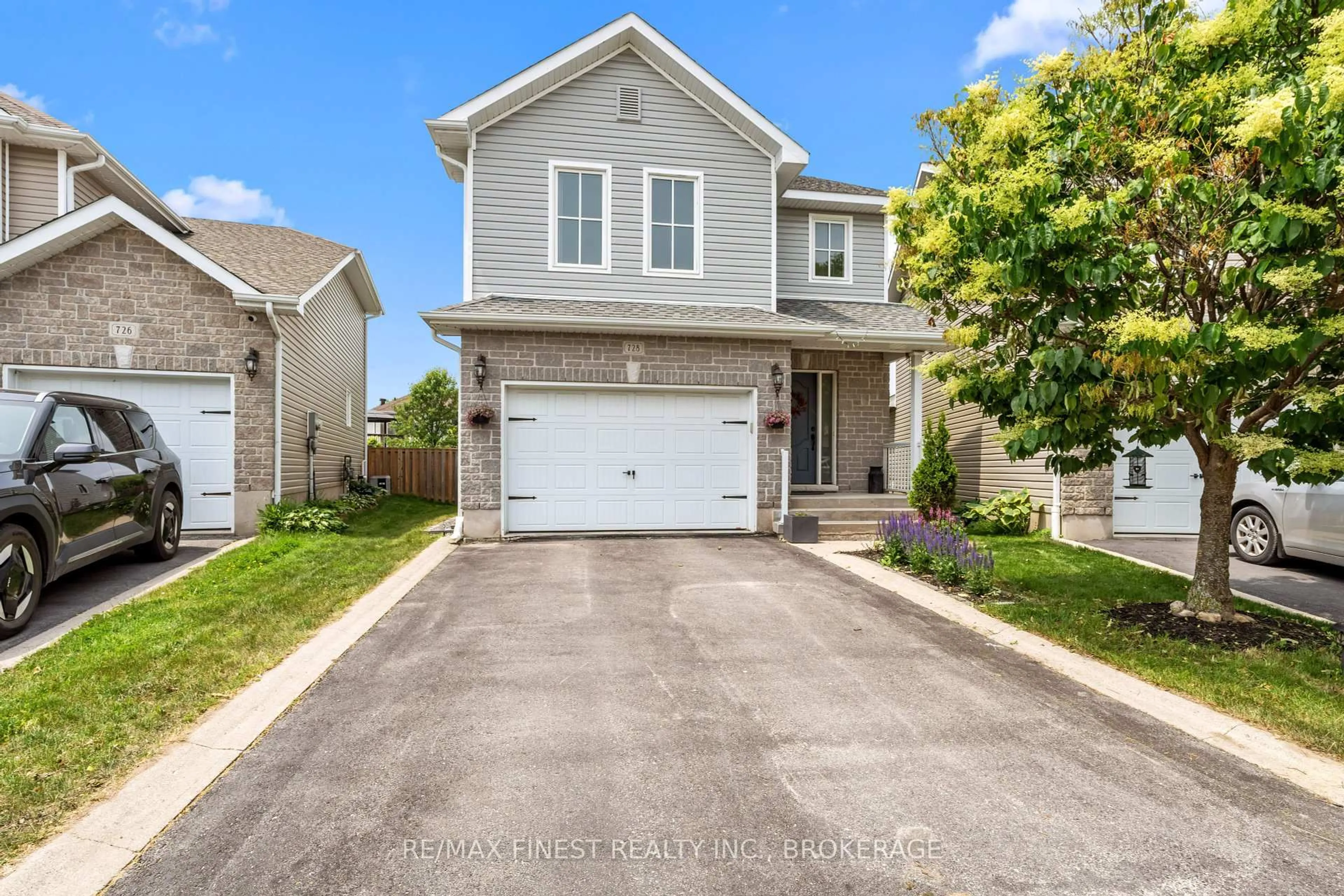 A pic from outside/outdoor area/front of a property/back of a property/a pic from drone, street for 728 Margaret Way, Kingston Ontario K7K 0C1