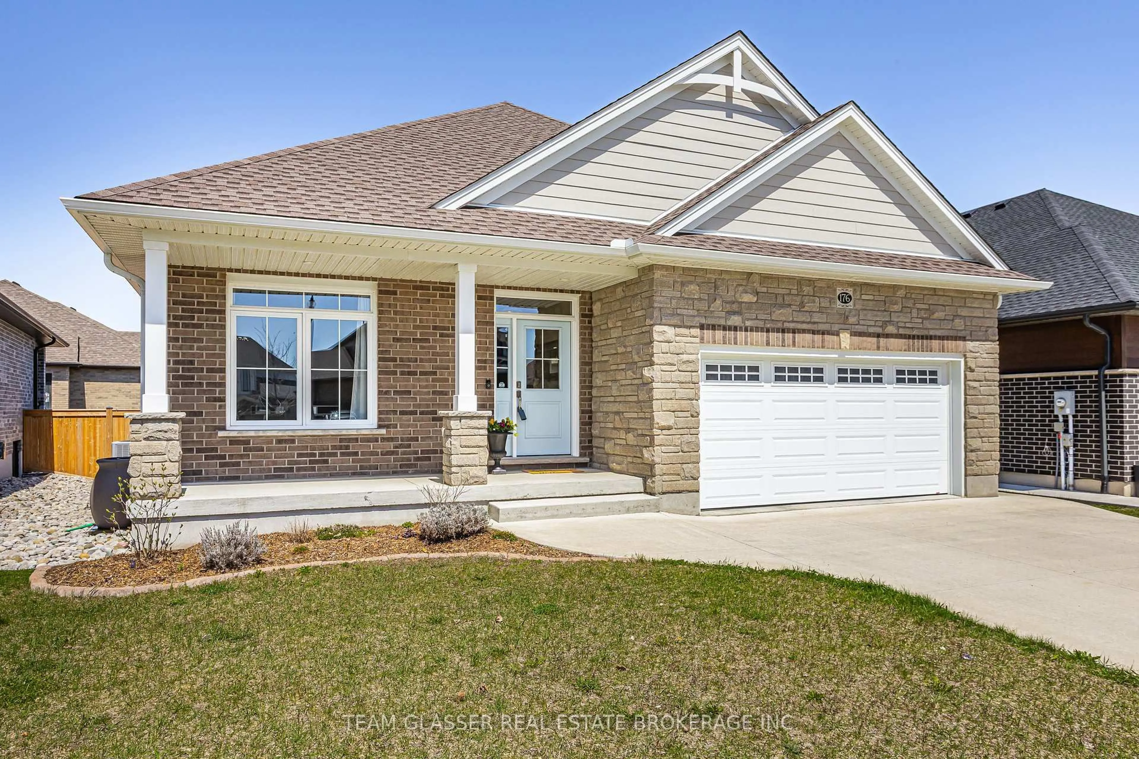Home with brick exterior material, street for 176 BOARDWALK Way, Thames Centre Ontario N0L 1G2