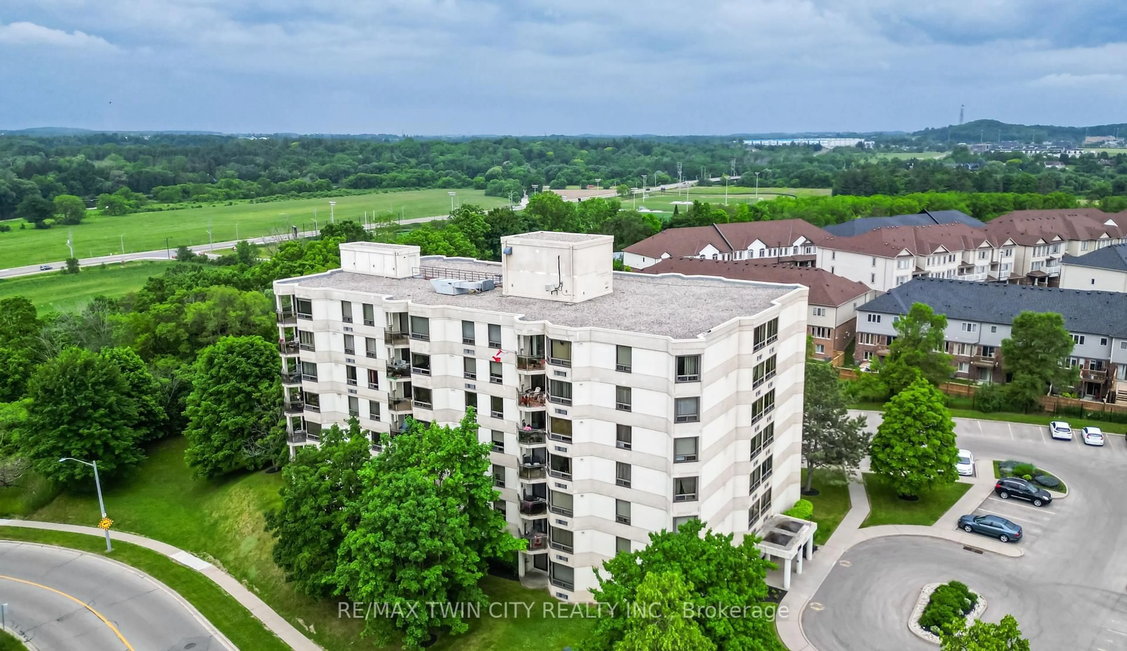 A pic from outside/outdoor area/front of a property/back of a property/a pic from drone, city buildings view from balcony for 688 Preston Pkwy #304, Cambridge Ontario N3H 5K6