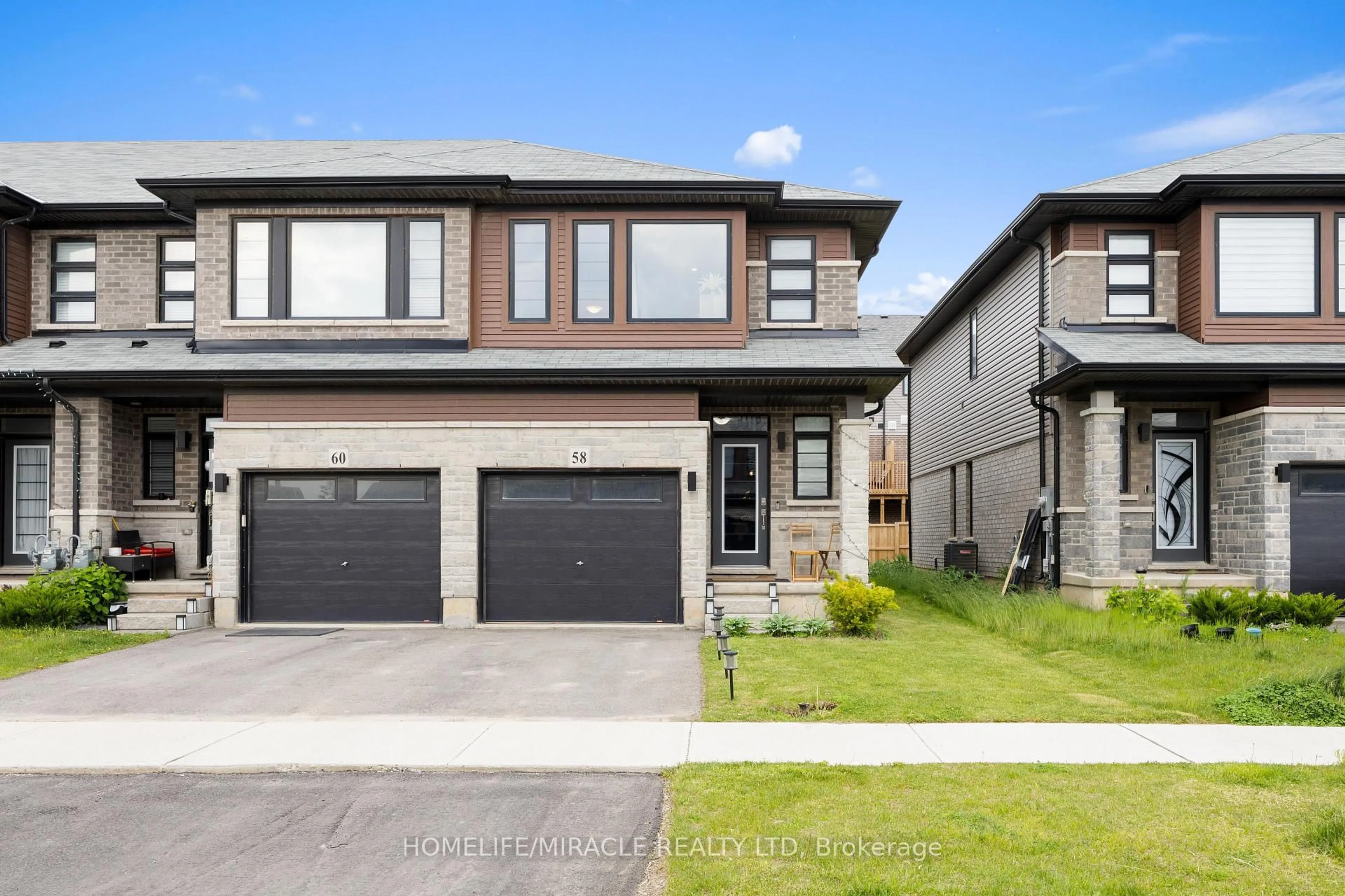 Home with brick exterior material, street for 58 June Callwood Way, Brant Ontario N3T 0T1