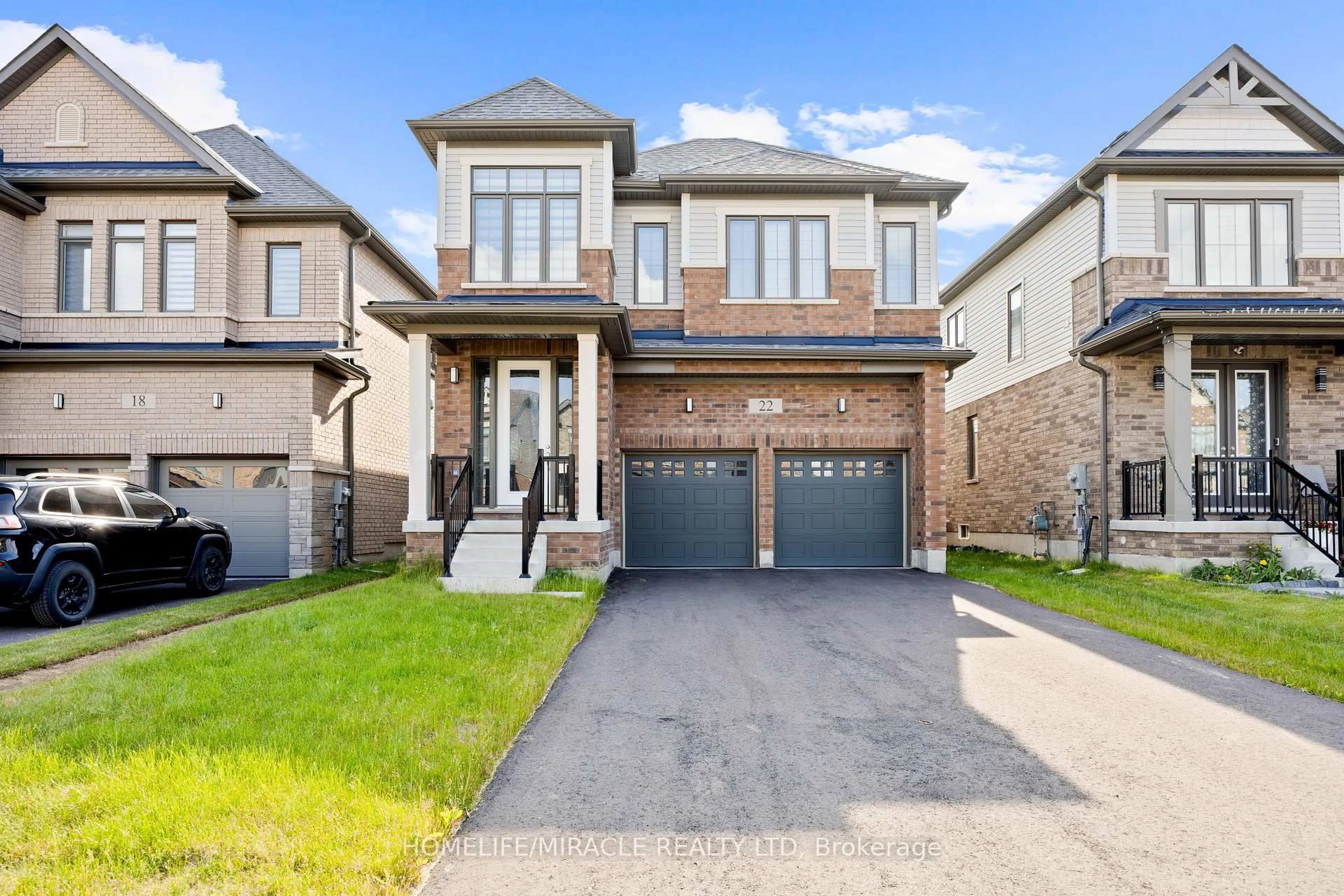 Home with brick exterior material, street for 22 Rustic Oak Tr, North Dumfries Ontario N0B 1E0