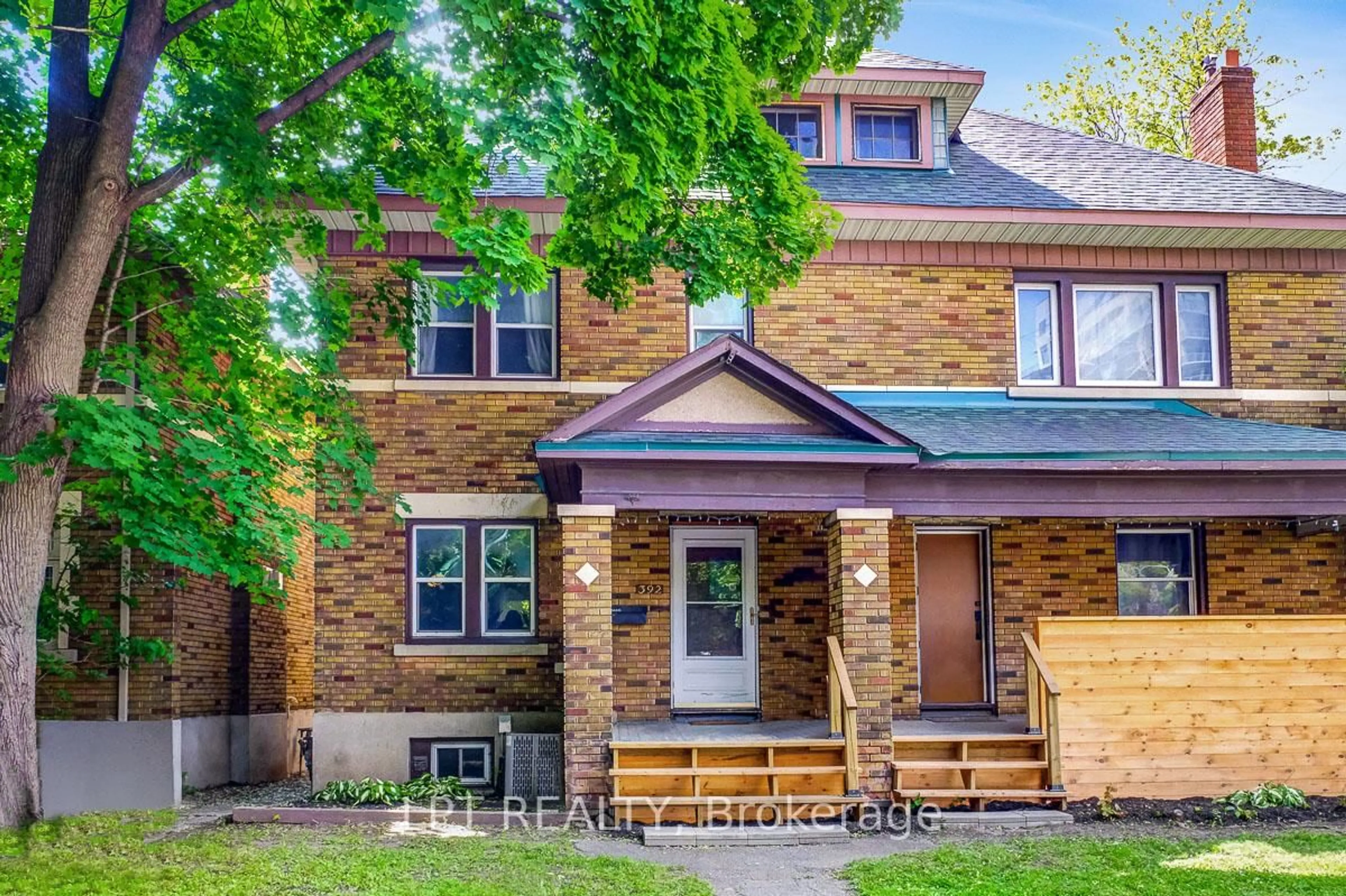 Home with brick exterior material, street for 392 First Ave, Ottawa Ontario K1S 2H1