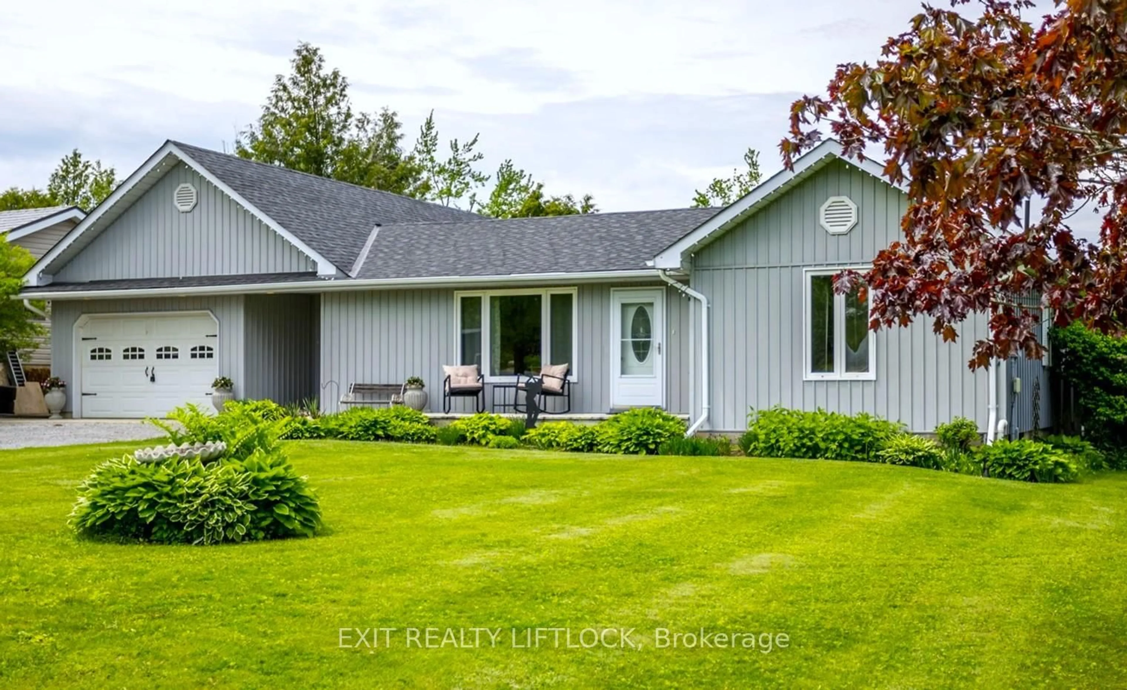 Home with vinyl exterior material, street for 890 Stewart Line, Cavan Monaghan Ontario L0A 1C0