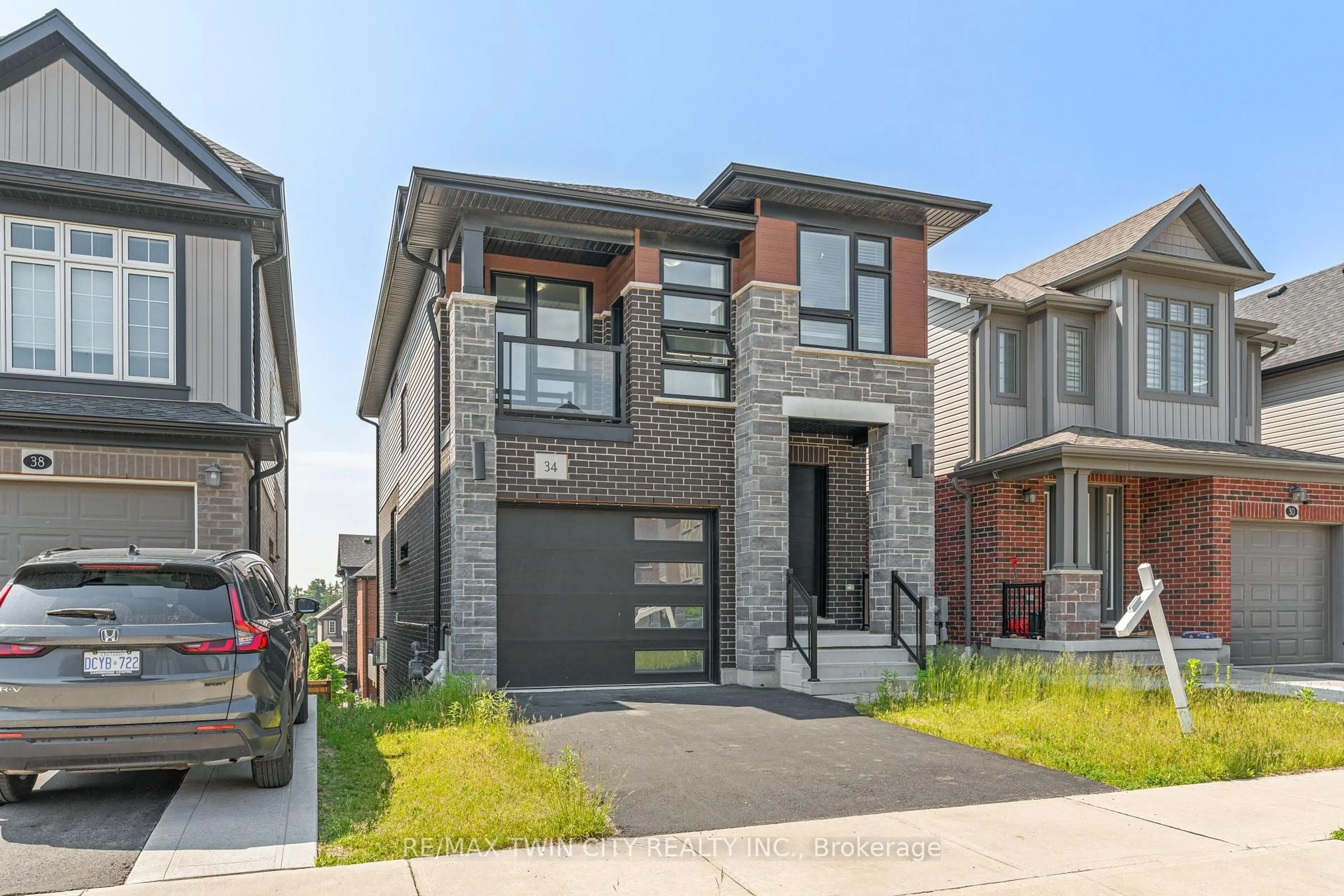 Home with brick exterior material, street for 34 SPORTSMAN HILL St, Kitchener Ontario N2P 0J3