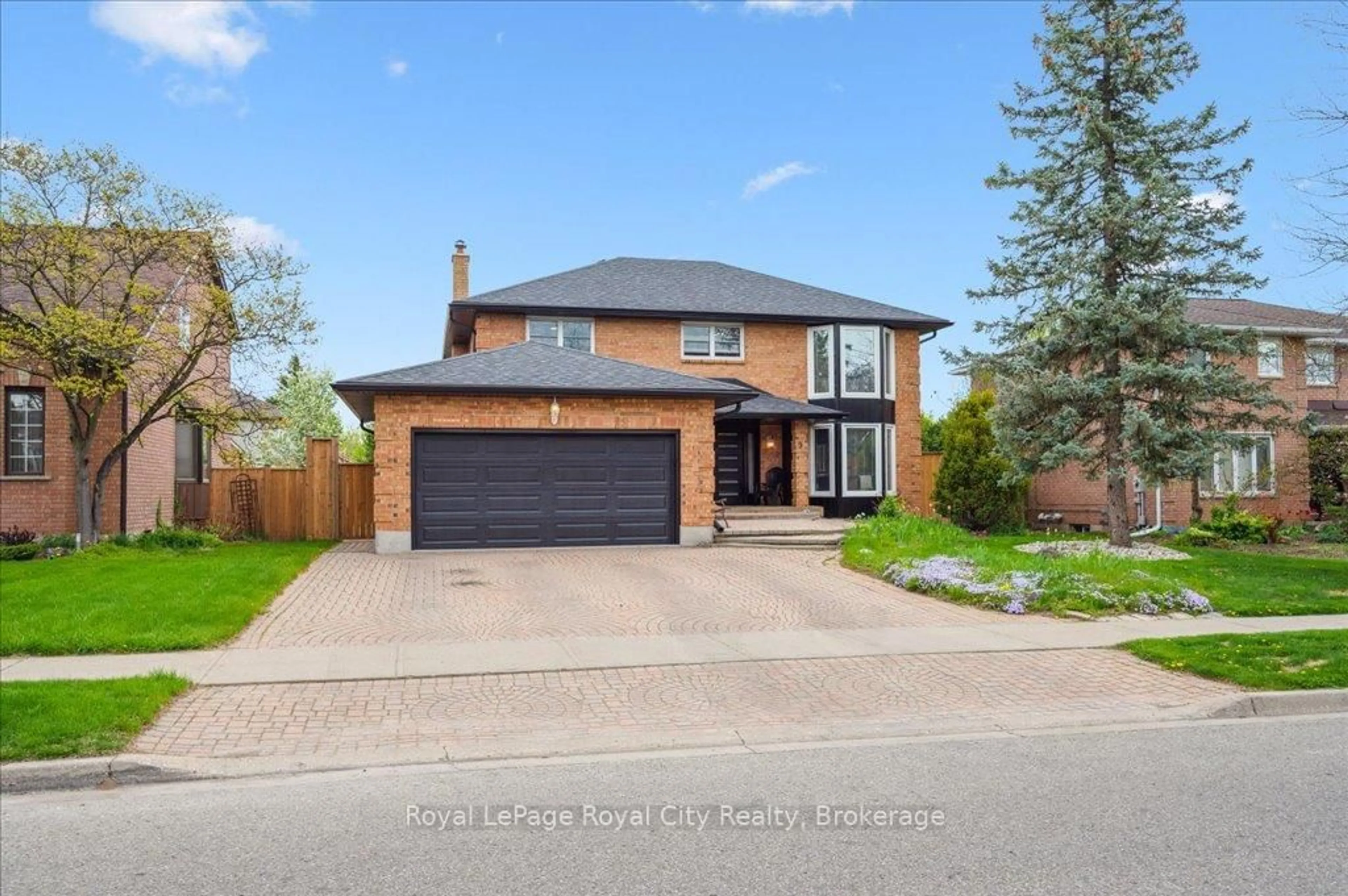 Home with brick exterior material, street for 9 Kortright Rd, Guelph Ontario N1G 4C8