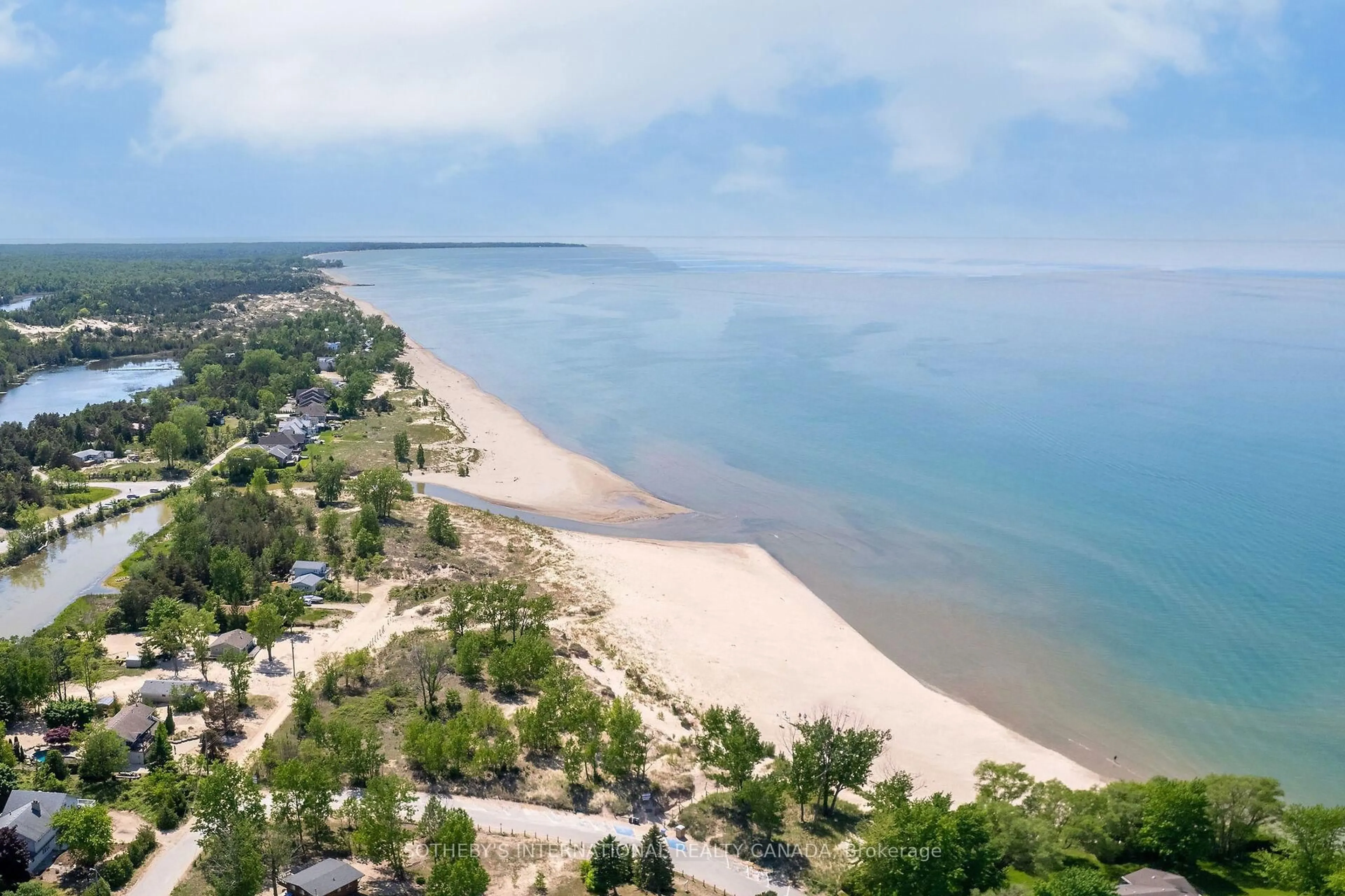 A pic from outside/outdoor area/front of a property/back of a property/a pic from drone, water/lake/river/ocean view for 7624 Riverside Dr, Lambton Shores Ontario N0M 2L0