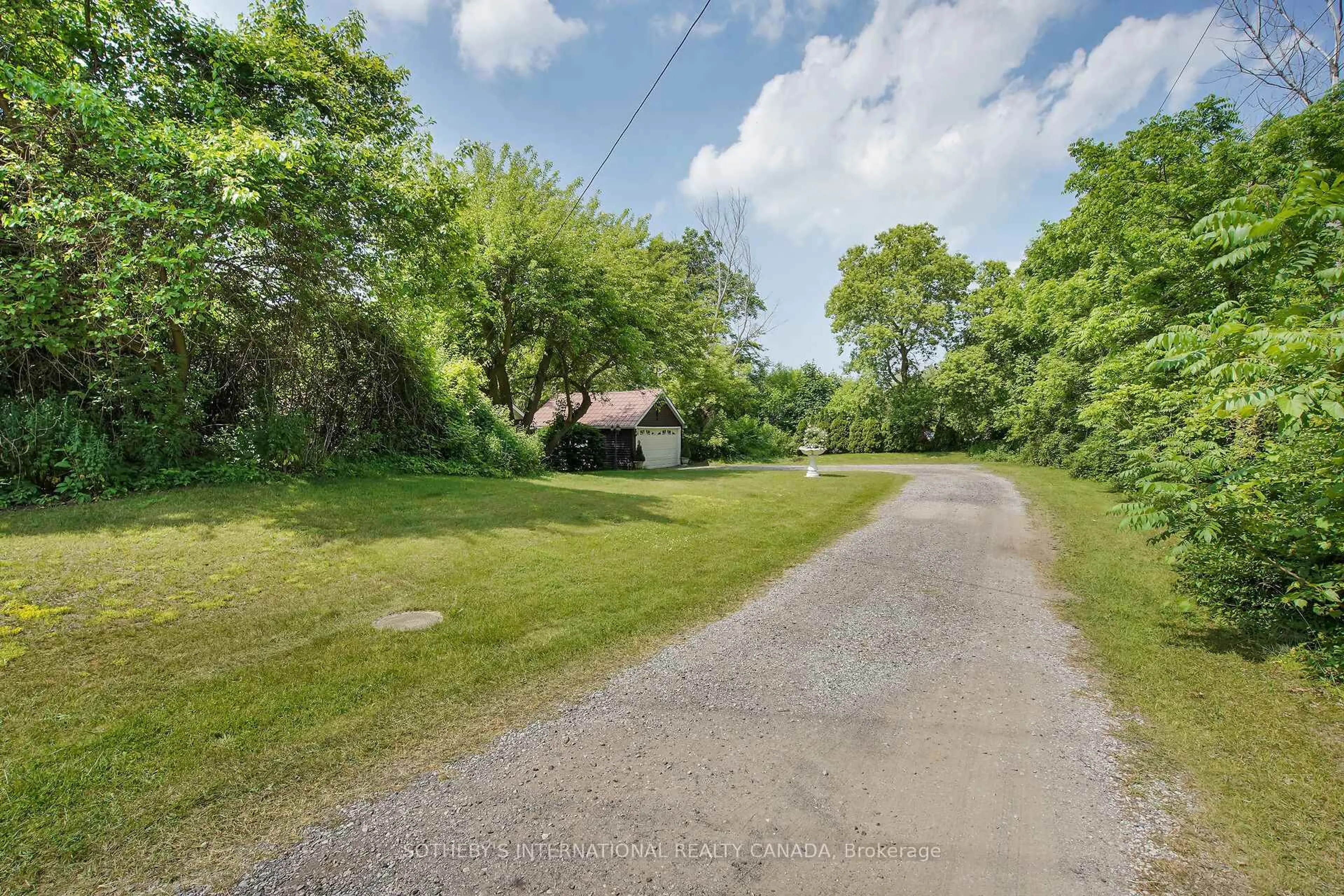 A pic from outside/outdoor area/front of a property/back of a property/a pic from drone, street for 7624 Riverside Dr, Lambton Shores Ontario N0M 2L0