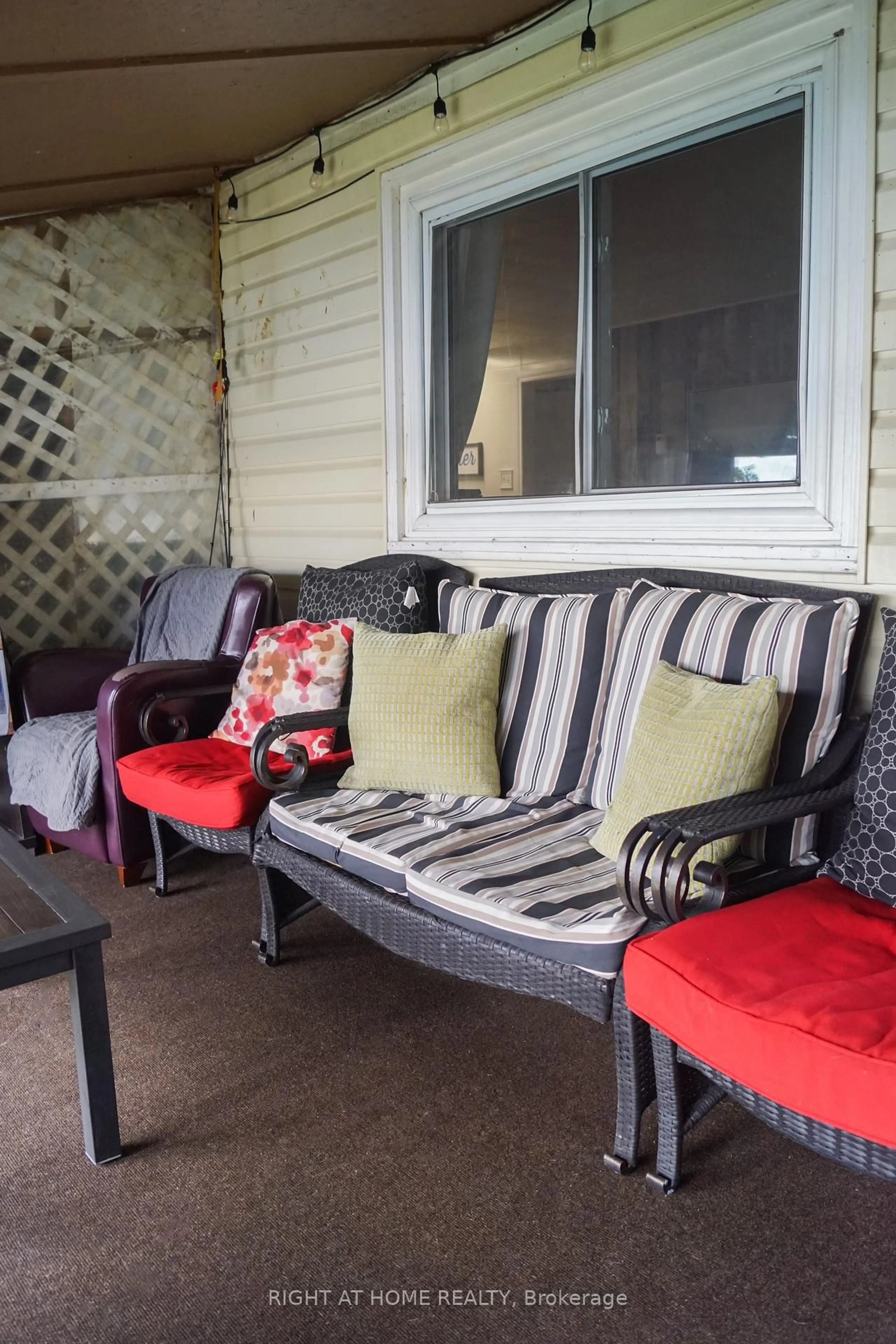 Patio, street for 117 Red Cedar Point Rd, Yarker Ontario K0K 3N0