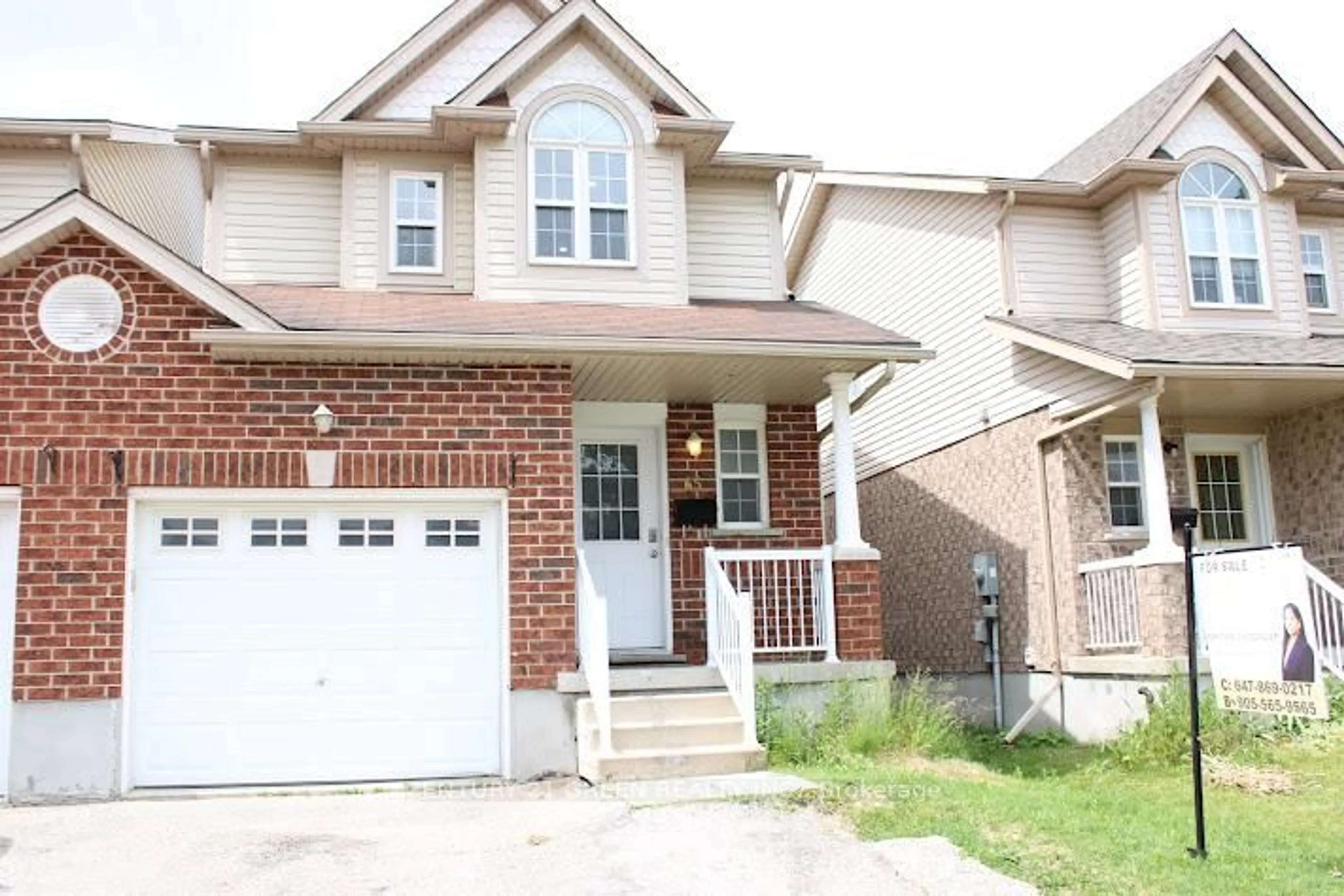Home with brick exterior material, street for 65 Donnenwerth Dr, Kitchener Ontario N2E 3W6