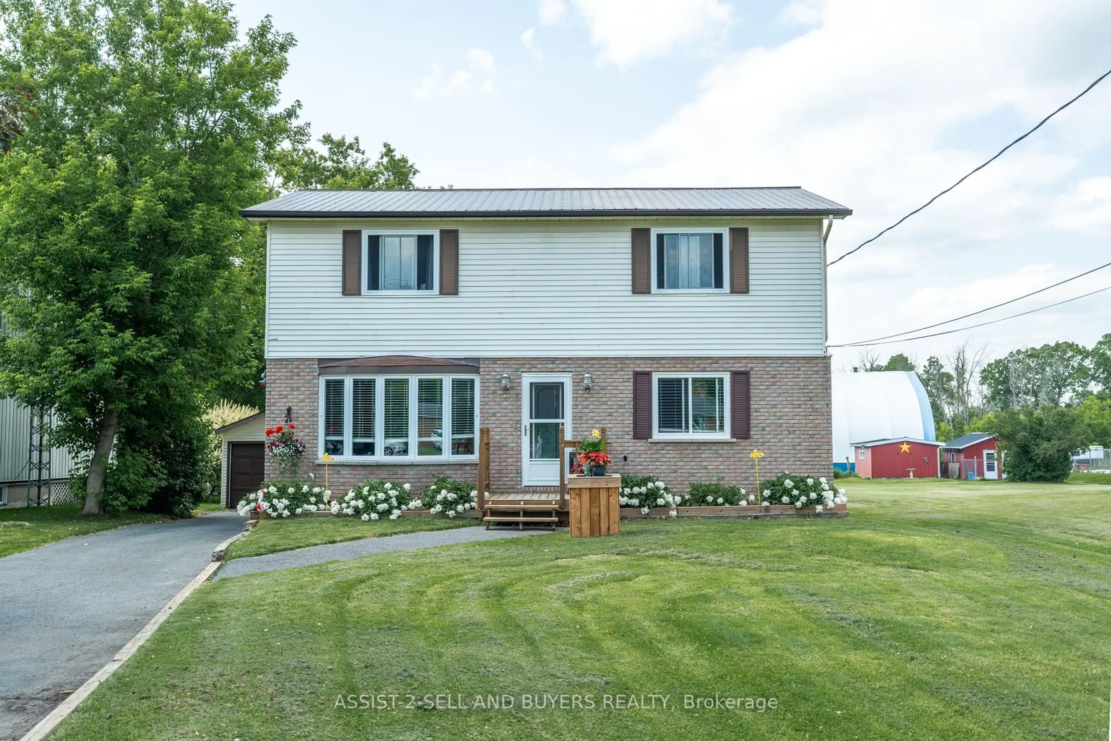 Home with brick exterior material, street for 17407 County Rd 18 Rd, South Stormont Ontario K0C 2A0