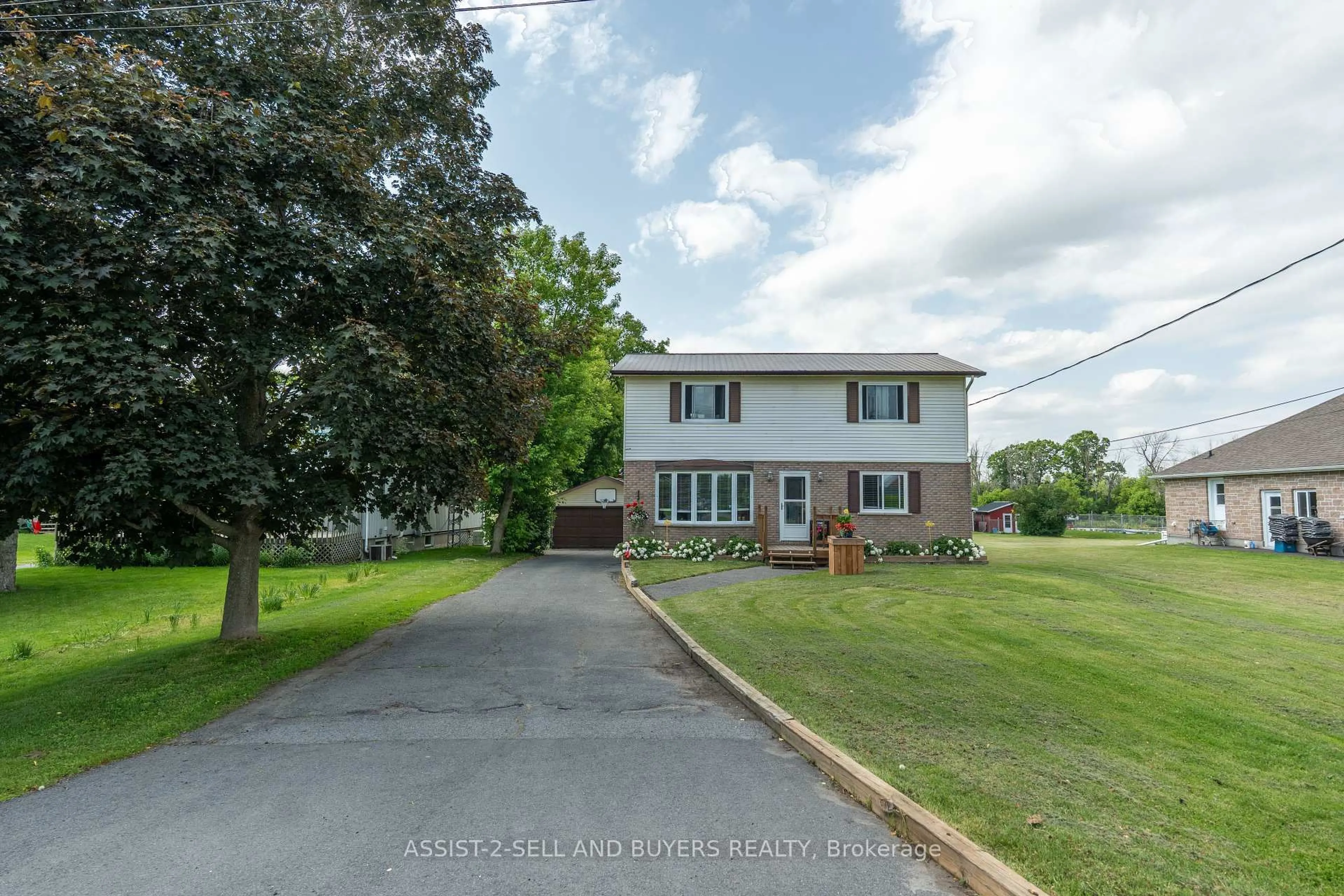 A pic from outside/outdoor area/front of a property/back of a property/a pic from drone, street for 17407 County Rd 18 Rd, South Stormont Ontario K0C 2A0