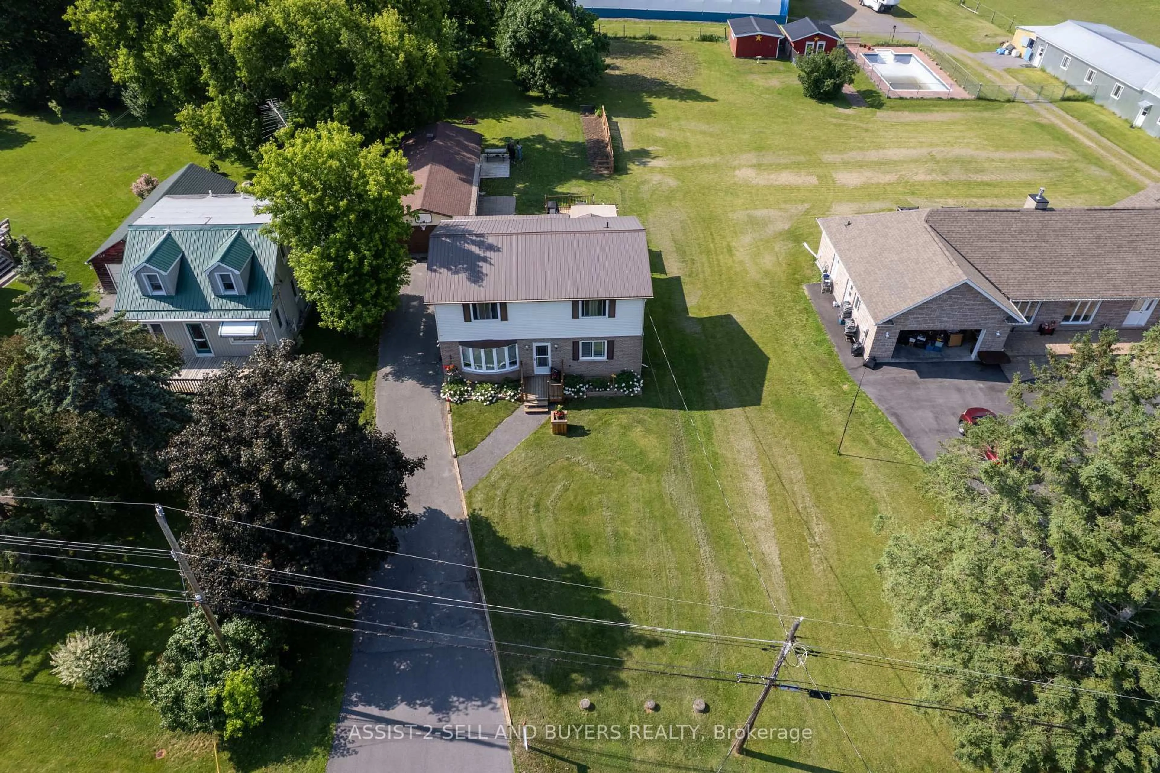 A pic from outside/outdoor area/front of a property/back of a property/a pic from drone, street for 17407 County Rd 18 Rd, South Stormont Ontario K0C 2A0