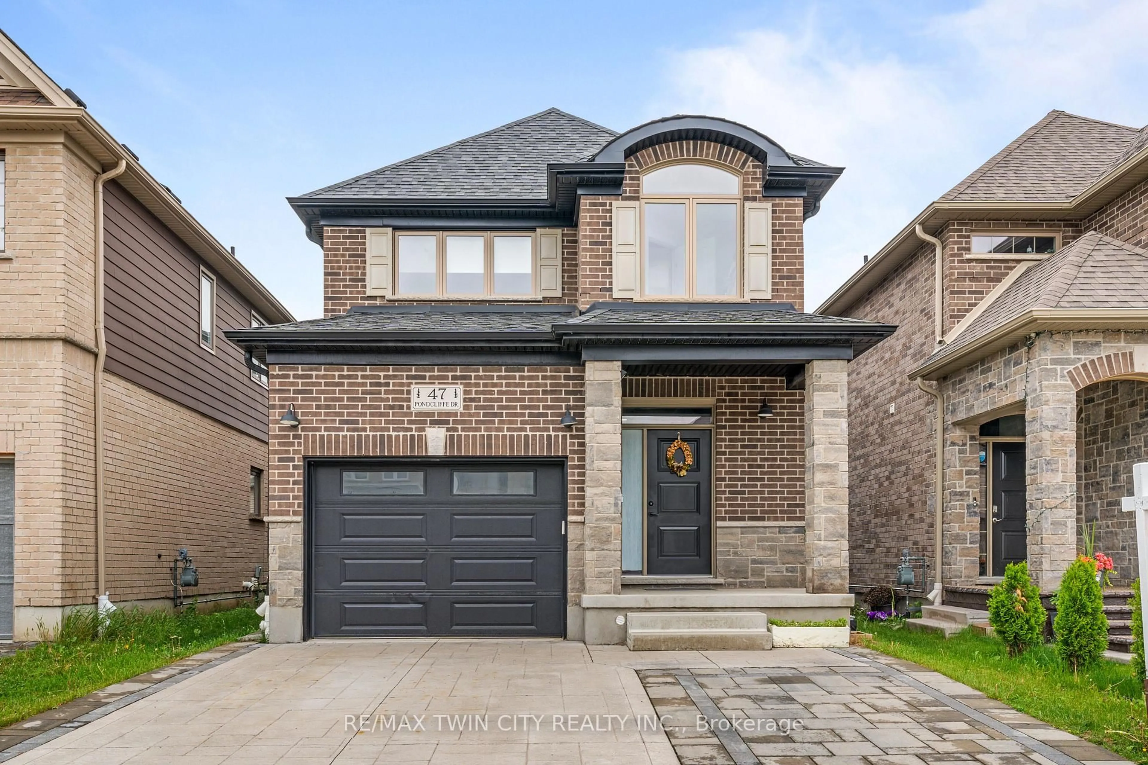 Home with brick exterior material, street for 47 PONDCLIFFE Dr, Kitchener Ontario N2R 0M3