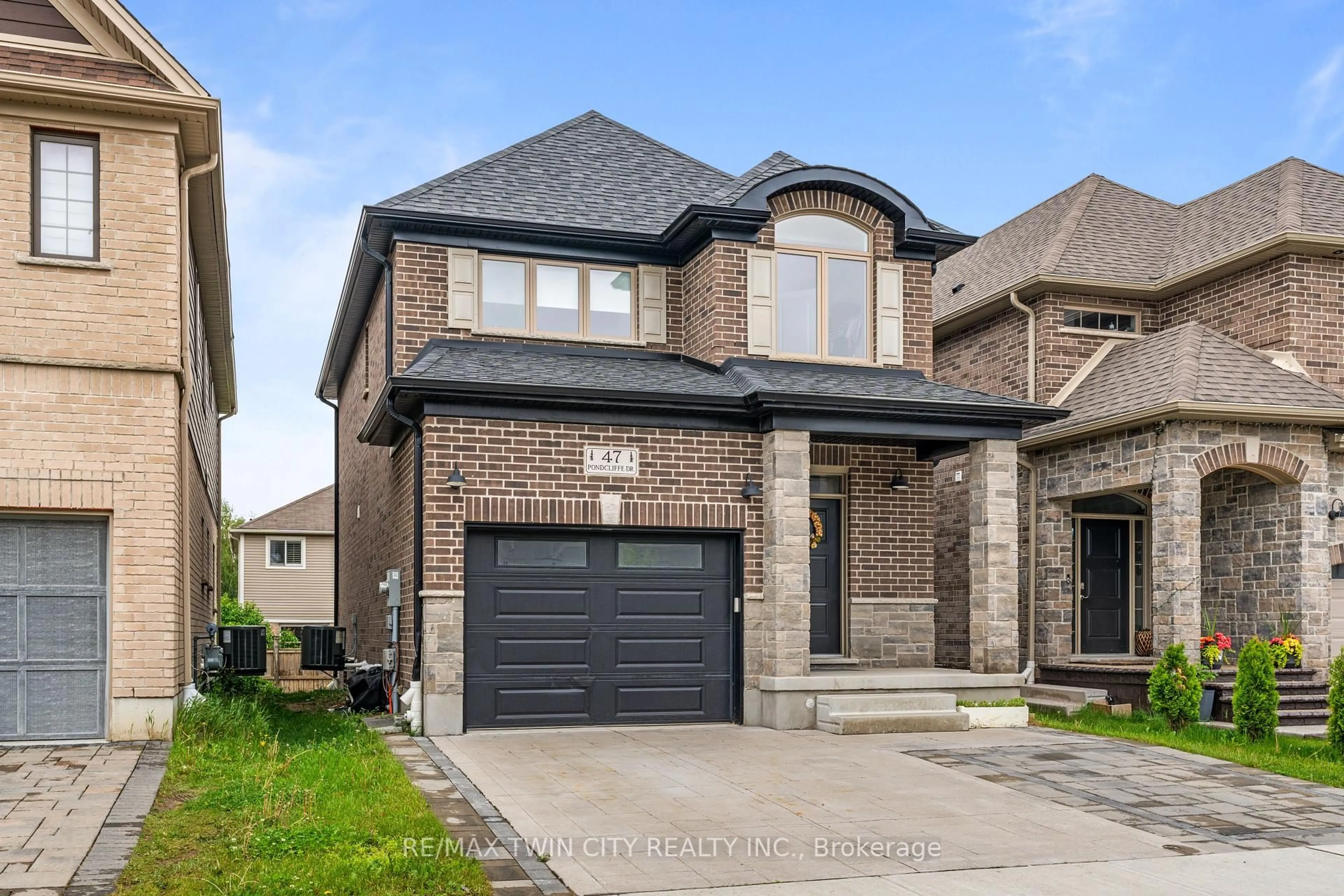 Home with brick exterior material, street for 47 PONDCLIFFE Dr, Kitchener Ontario N2R 0M3