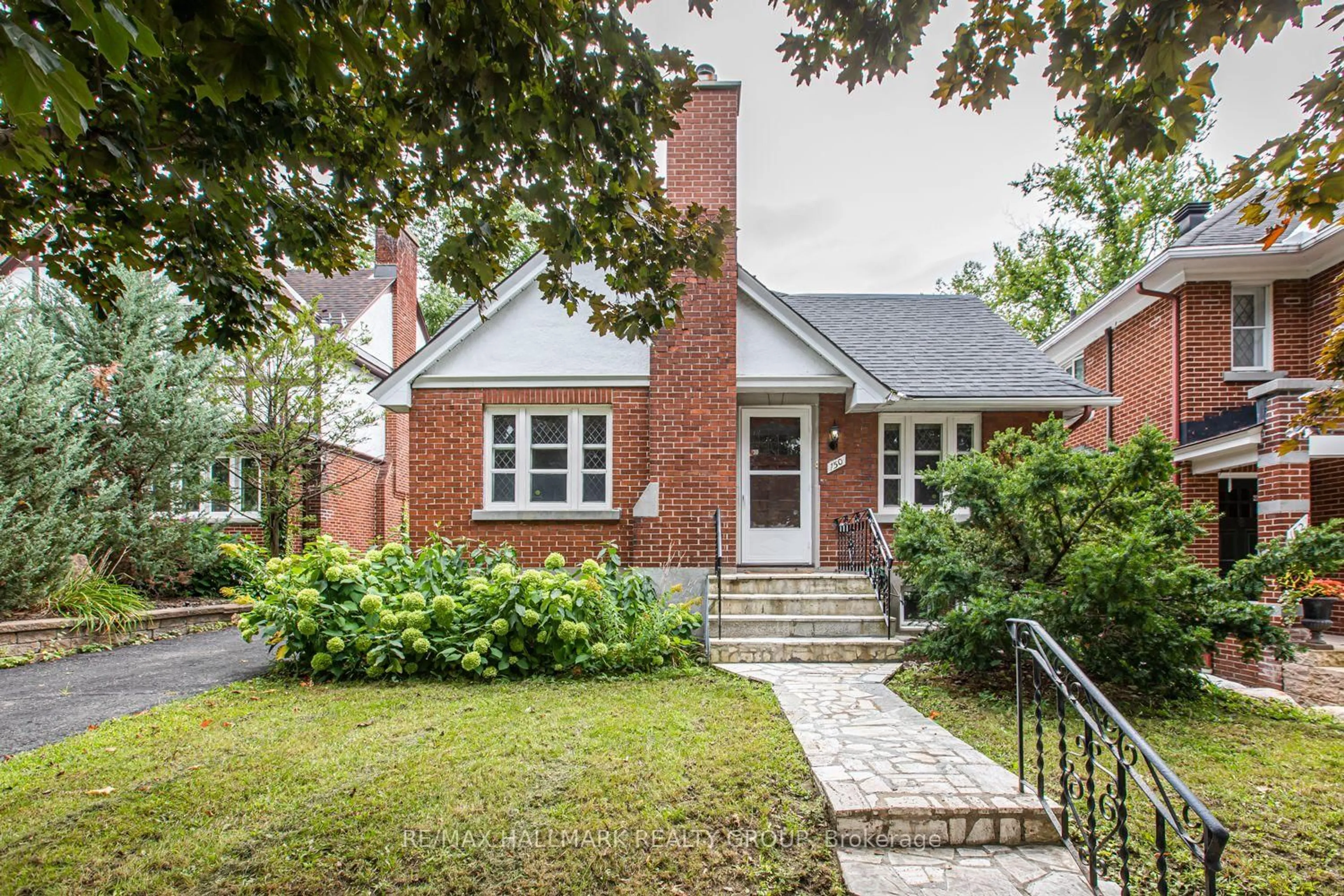 Home with brick exterior material, street for 150 Ruskin St, Ottawa Ontario K1Y 4C1