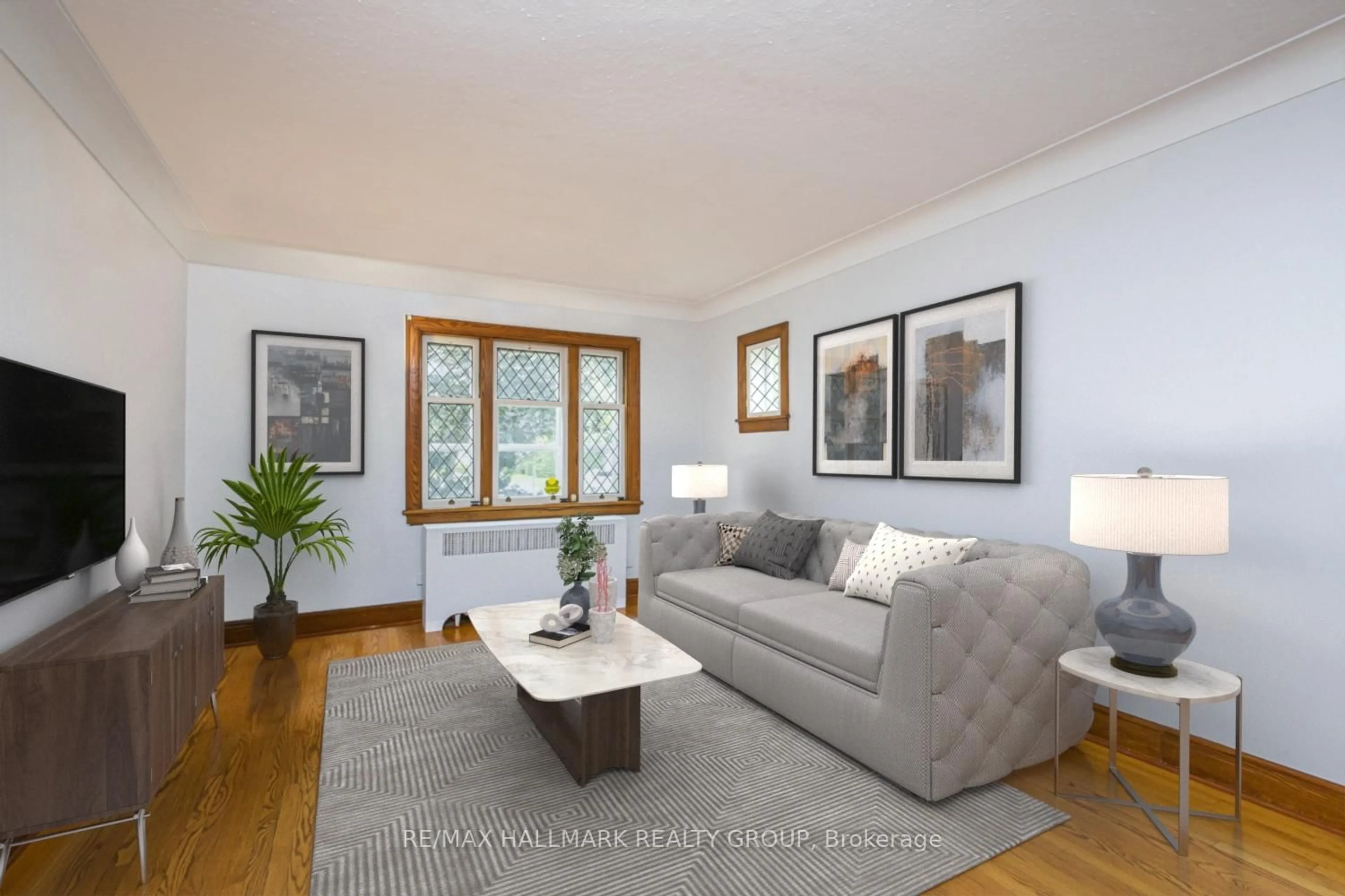 Living room with furniture, wood/laminate floor for 150 Ruskin St, Ottawa Ontario K1Y 4C1