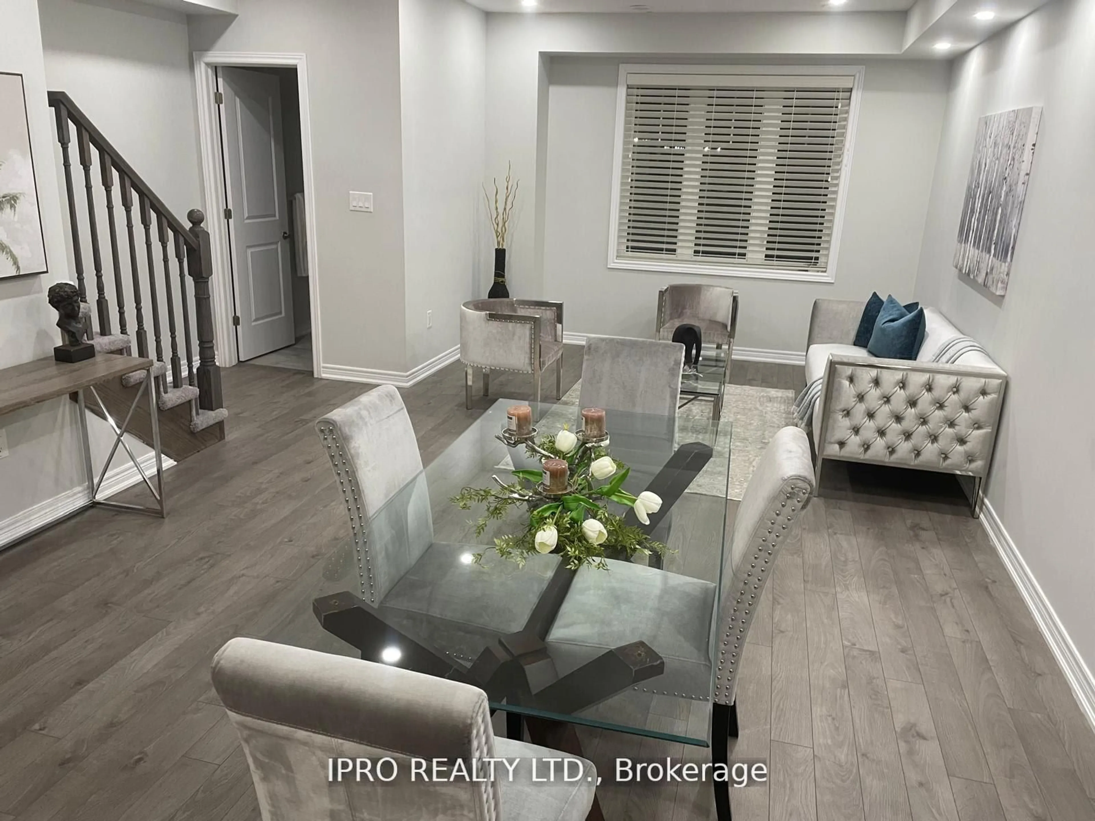 Living room with furniture, wood/laminate floor for 34 Rapids Lane, Hamilton Ontario L8K 0A4