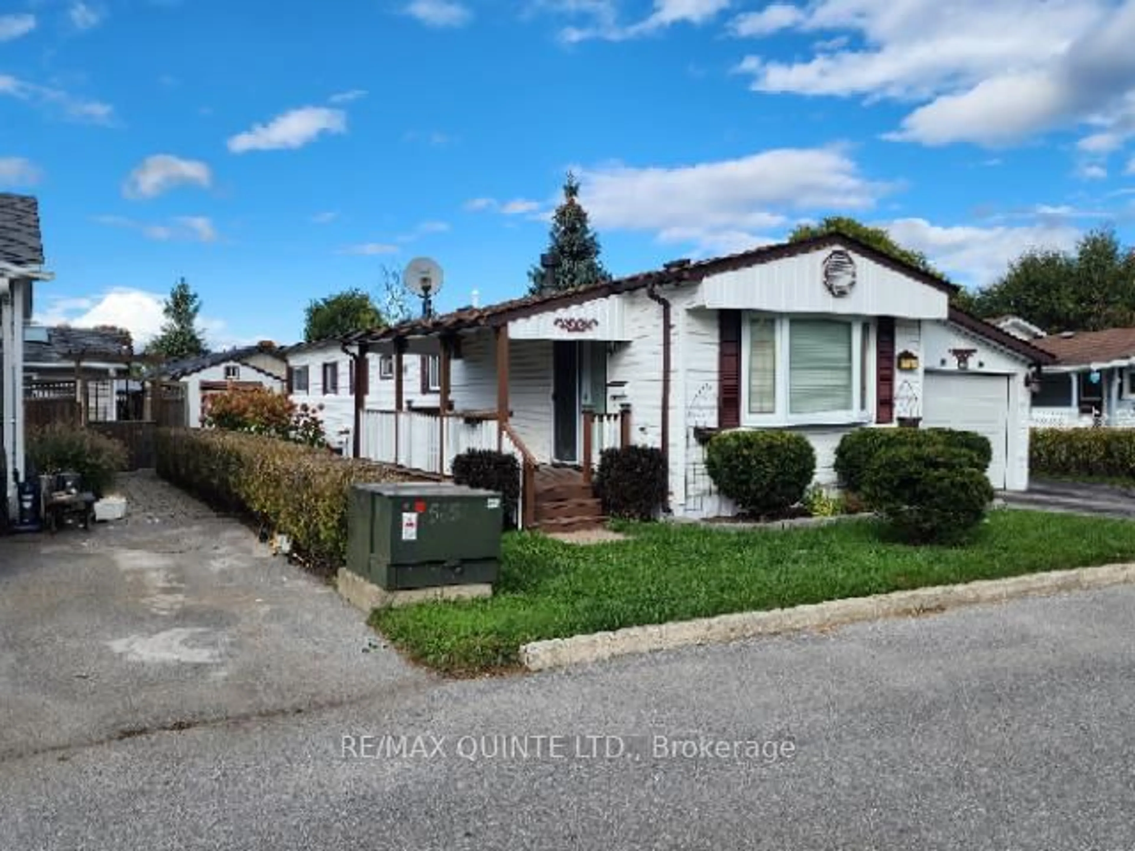 Home with vinyl exterior material, street for 12 Grouse Lane, Quinte West Ontario K8N 4Z3