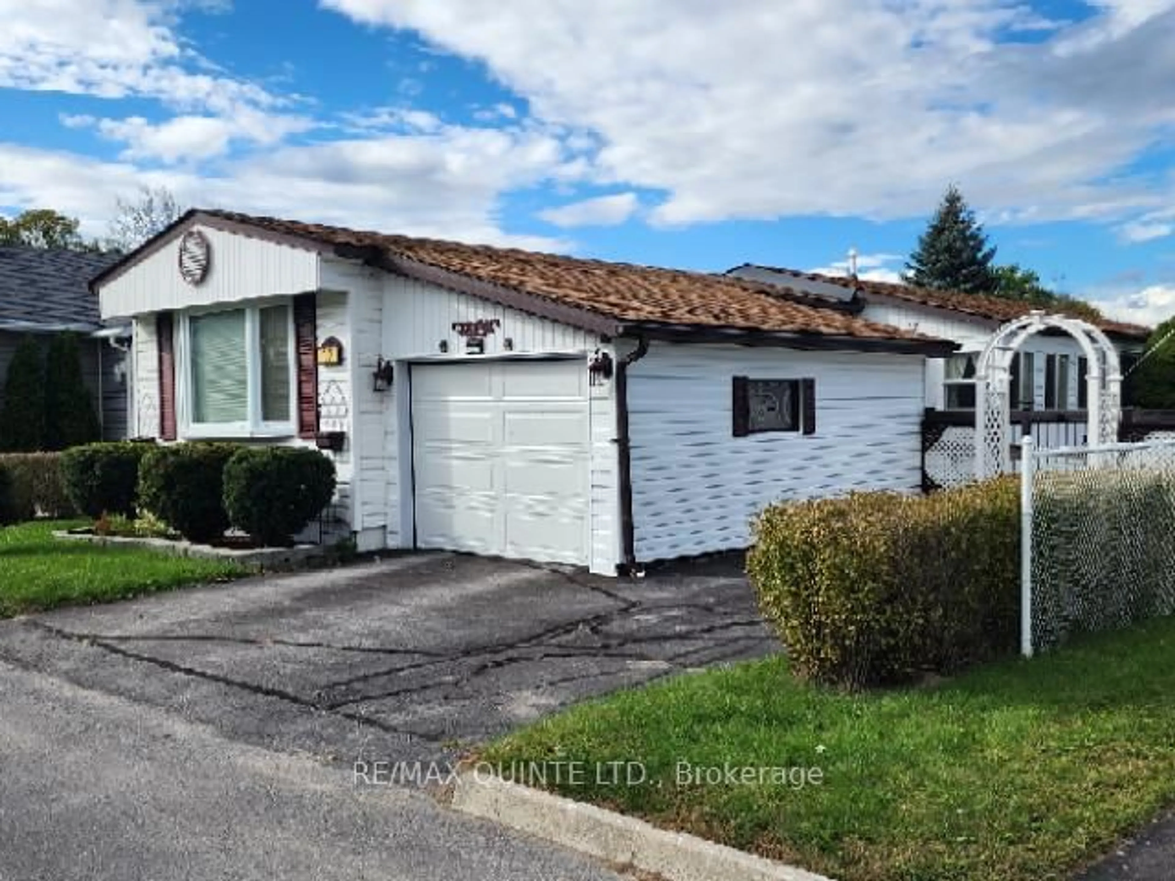 Home with vinyl exterior material, street for 12 Grouse Lane, Quinte West Ontario K8N 4Z3