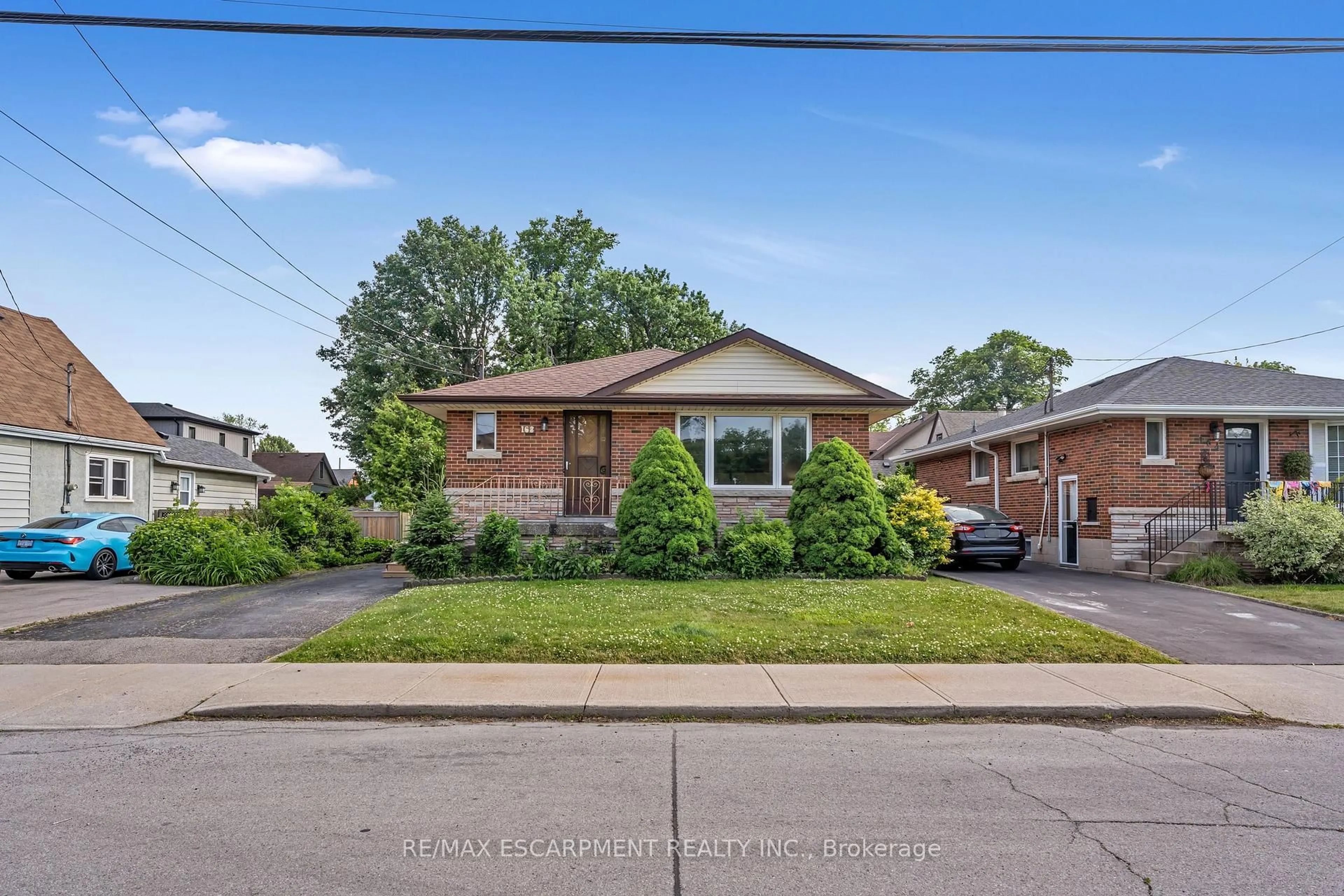 Home with brick exterior material, street for 168 Brucedale Ave, Hamilton Ontario L9A 1N7