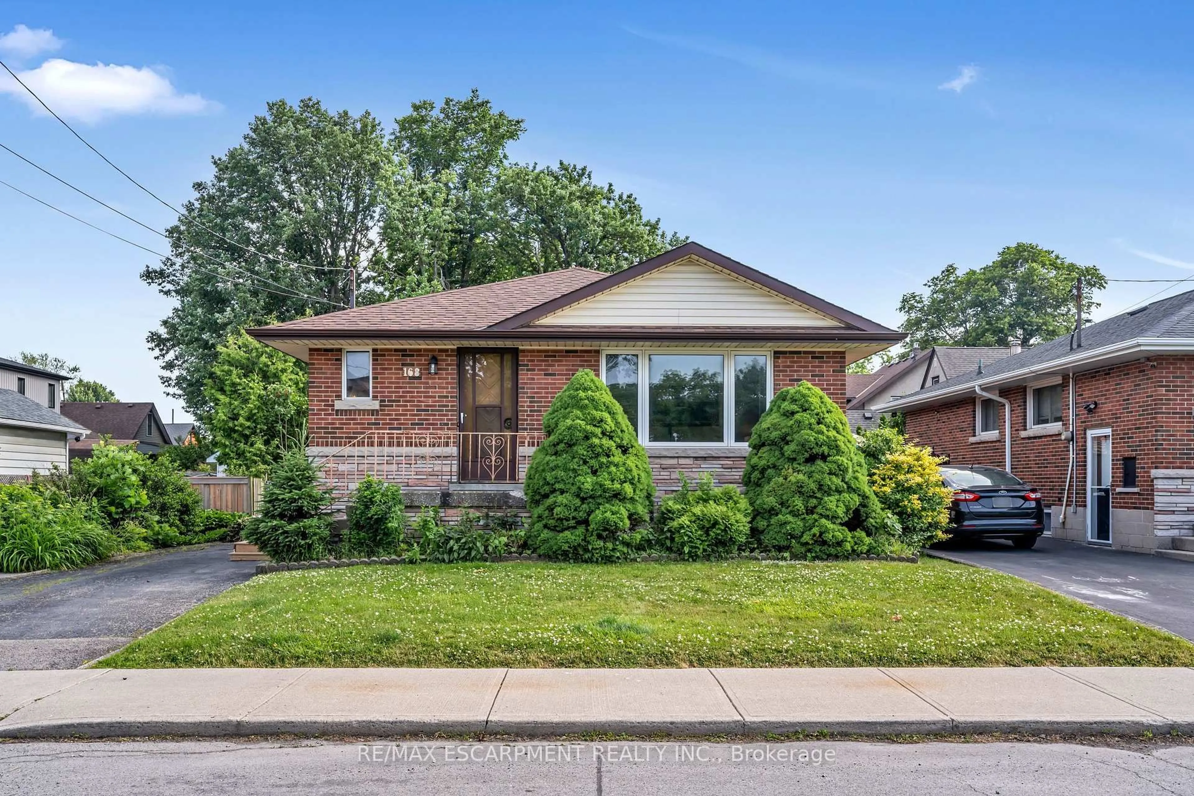 Home with brick exterior material, street for 168 Brucedale Ave, Hamilton Ontario L9A 1N7