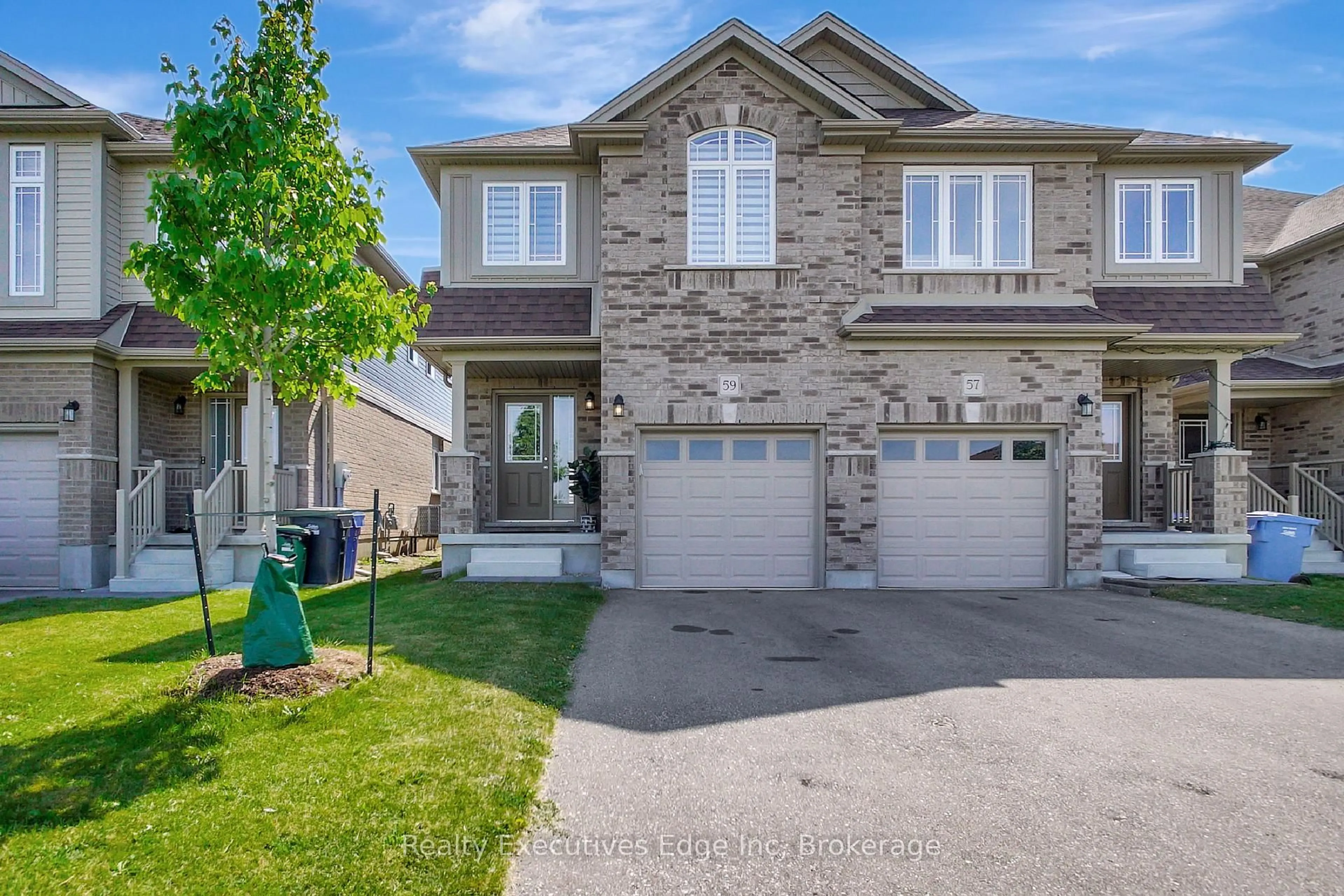 Home with brick exterior material, street for 59 John Brabson Cres, Guelph Ontario N1G 0G5