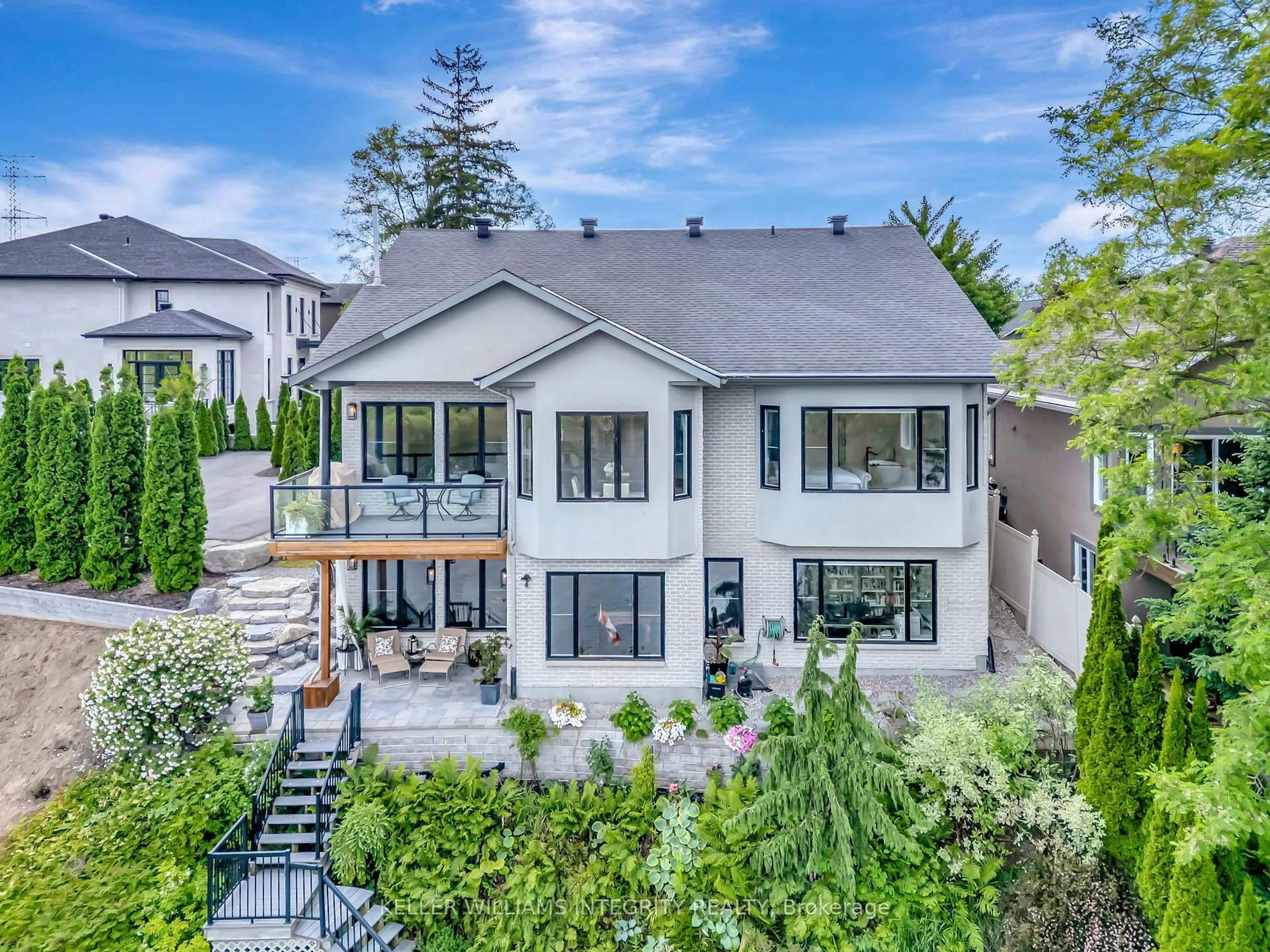 A pic from outside/outdoor area/front of a property/back of a property/a pic from drone, unknown for 2 Rideau Shore Crt, Ottawa Ontario K2C 3Y8