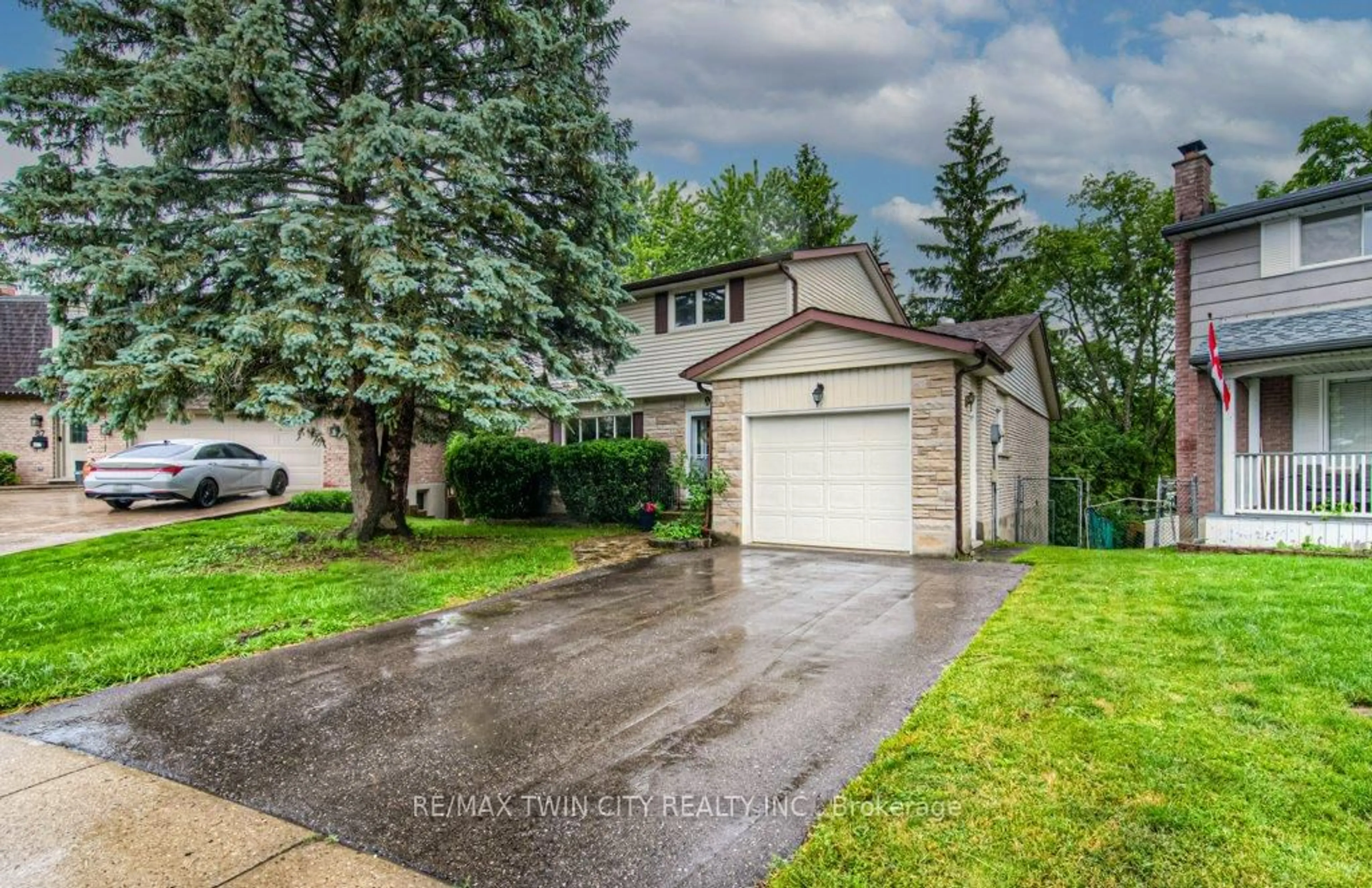 Home with vinyl exterior material, street for 91 Nathaniel Cres, Kitchener Ontario N2P 1L3