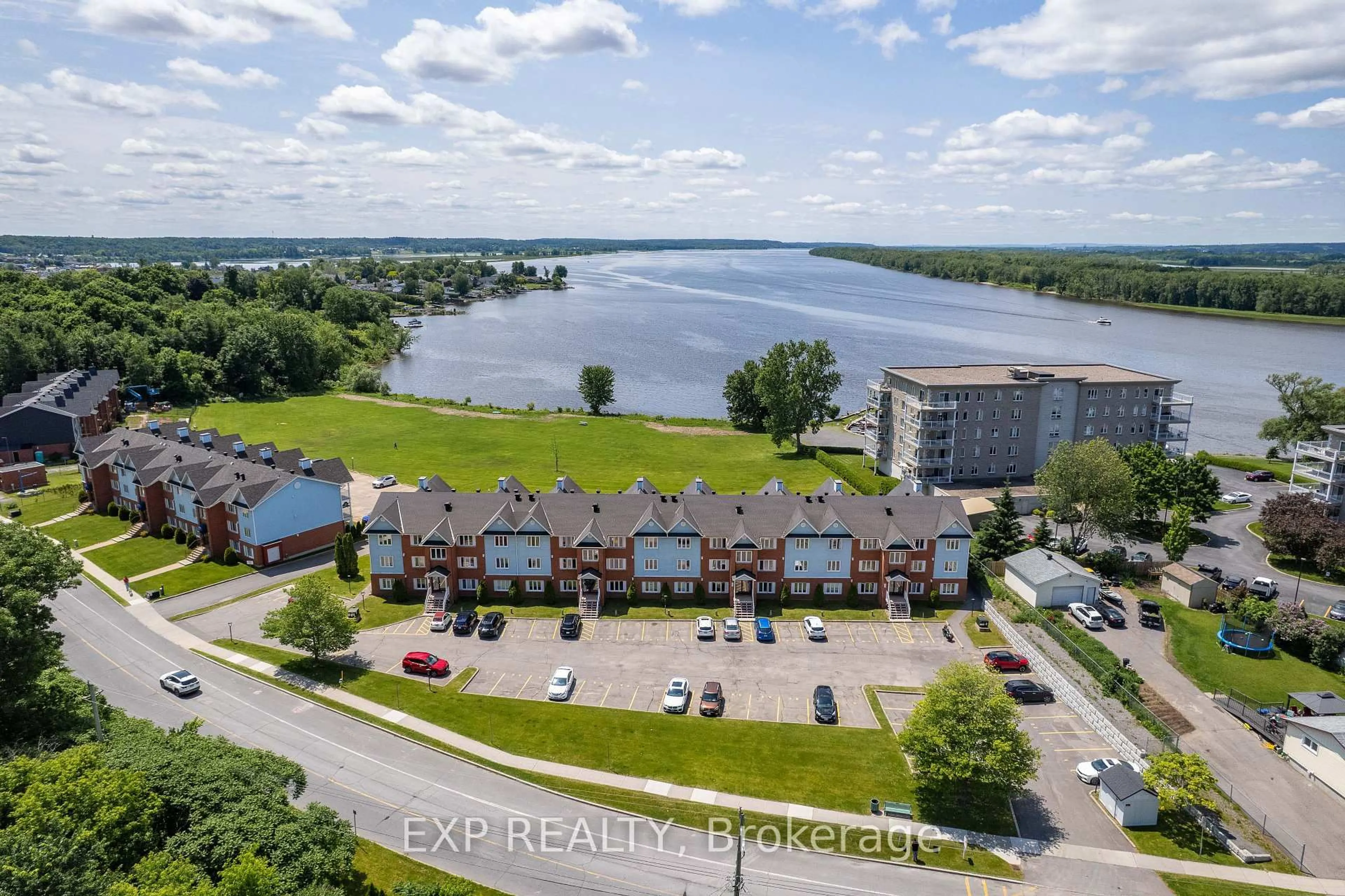 A pic from outside/outdoor area/front of a property/back of a property/a pic from drone, water/lake/river/ocean view for 160 EDWARDS St #B6, Clarence-Rockland Ontario K4K 1H9