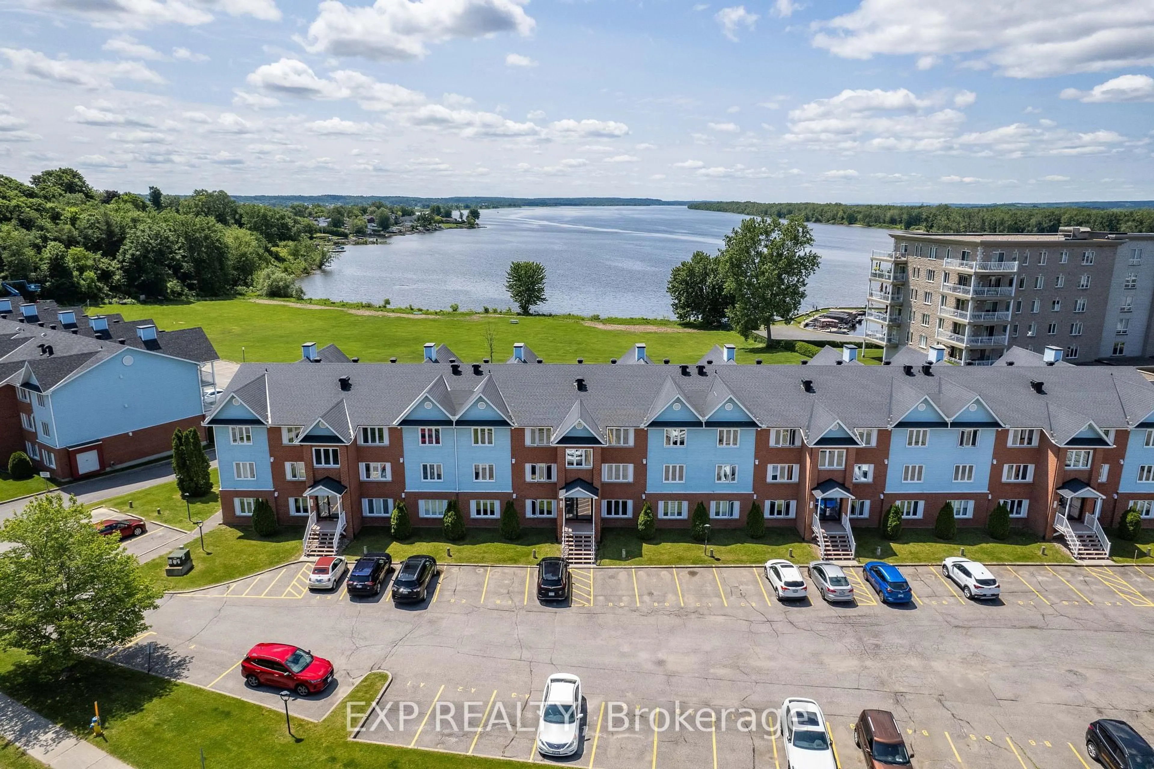 A pic from outside/outdoor area/front of a property/back of a property/a pic from drone, water/lake/river/ocean view for 160 EDWARDS St #B6, Clarence-Rockland Ontario K4K 1H9