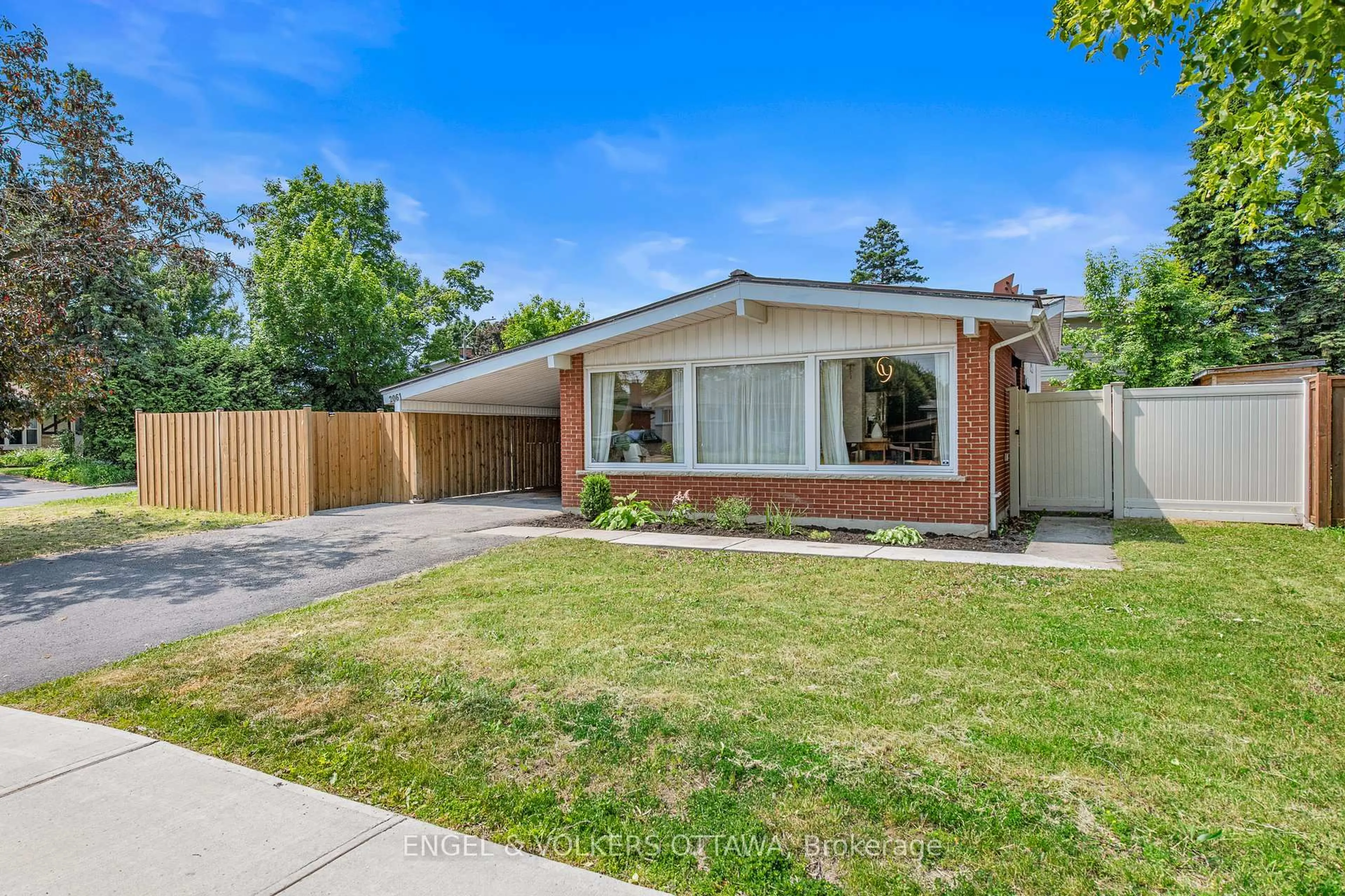 Home with brick exterior material, street for 2061 Featherston Dr, Ottawa Ontario K1H 6R1