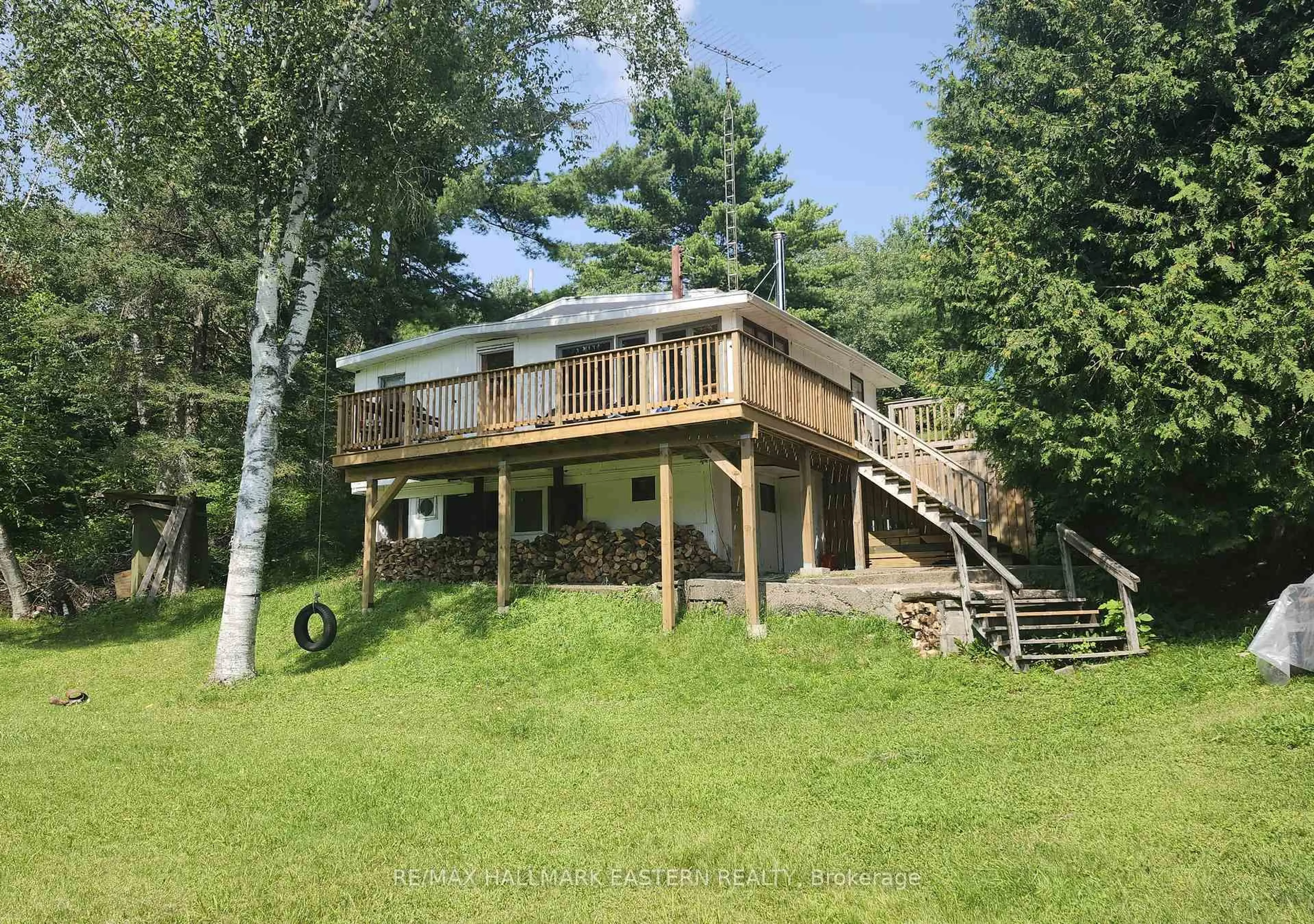 A pic from outside/outdoor area/front of a property/back of a property/a pic from drone, water/lake/river/ocean view for 106 LAKEVIEW Cres, North Kawartha Ontario K0L 1A0