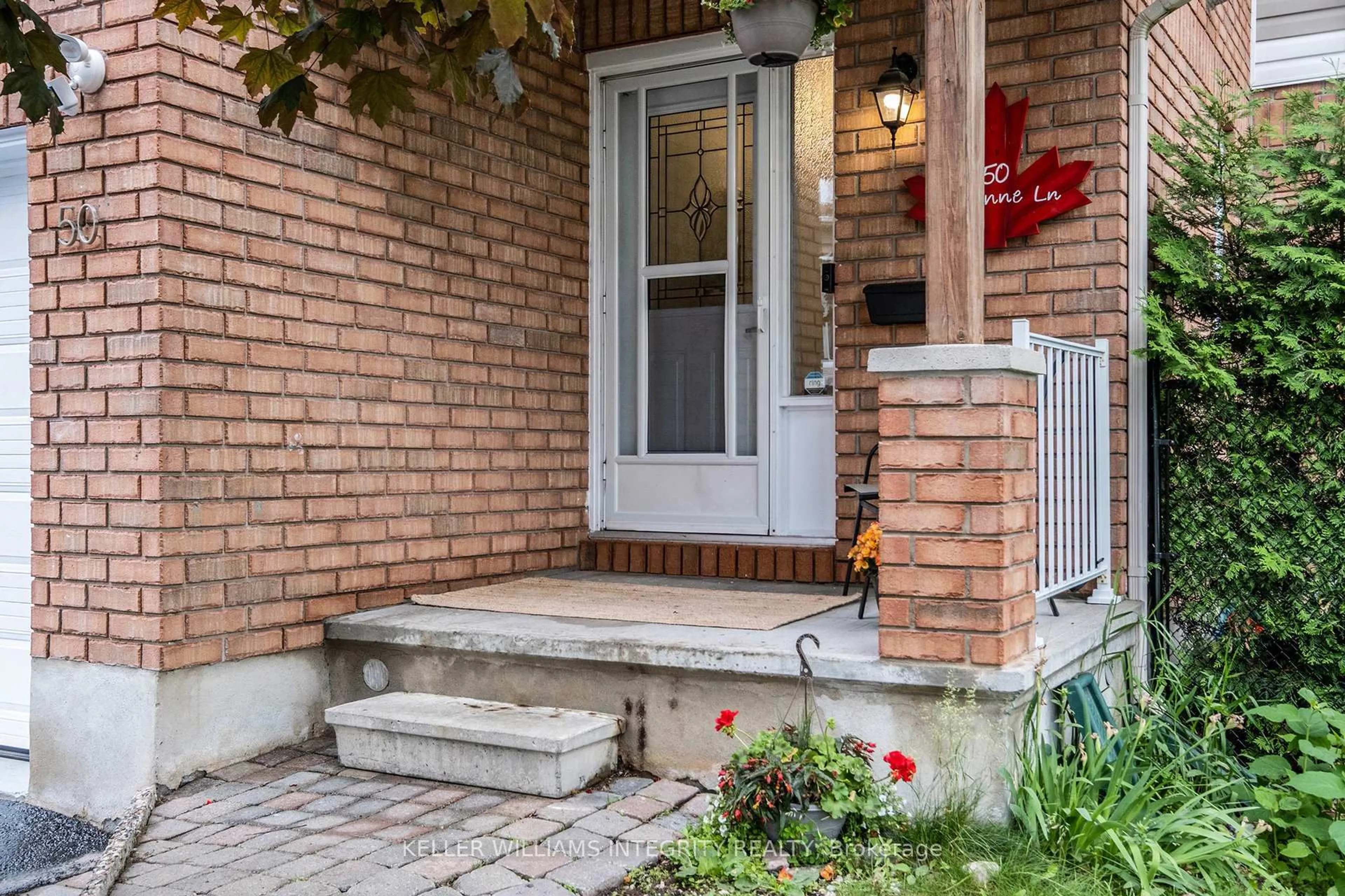 Home with brick exterior material, street for 50 Roseanne Lane, Ottawa Ontario K1B 1C2