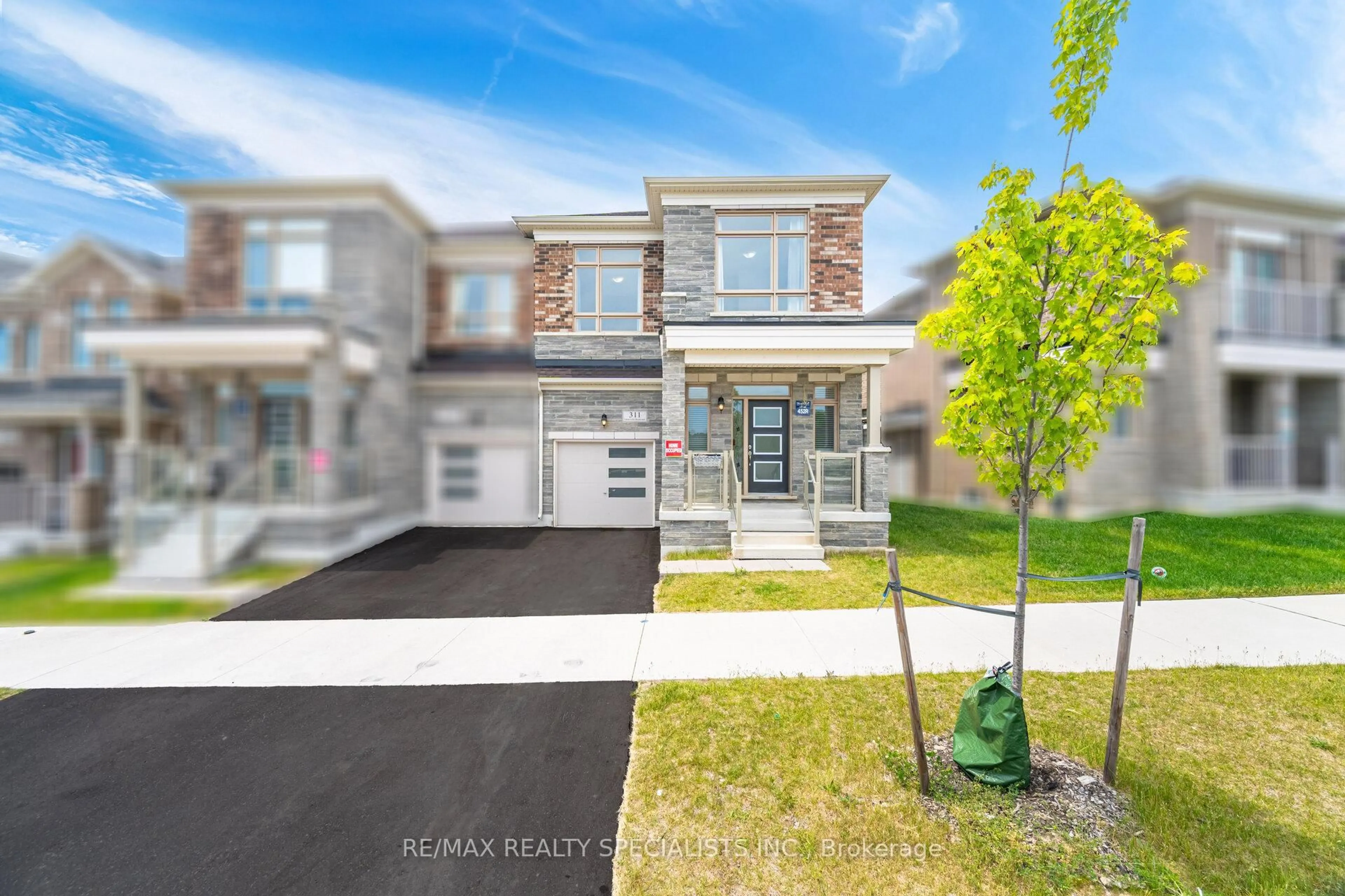 Home with brick exterior material, street for 311 Great Falls Blvd, Hamilton Ontario L8B 1Z5