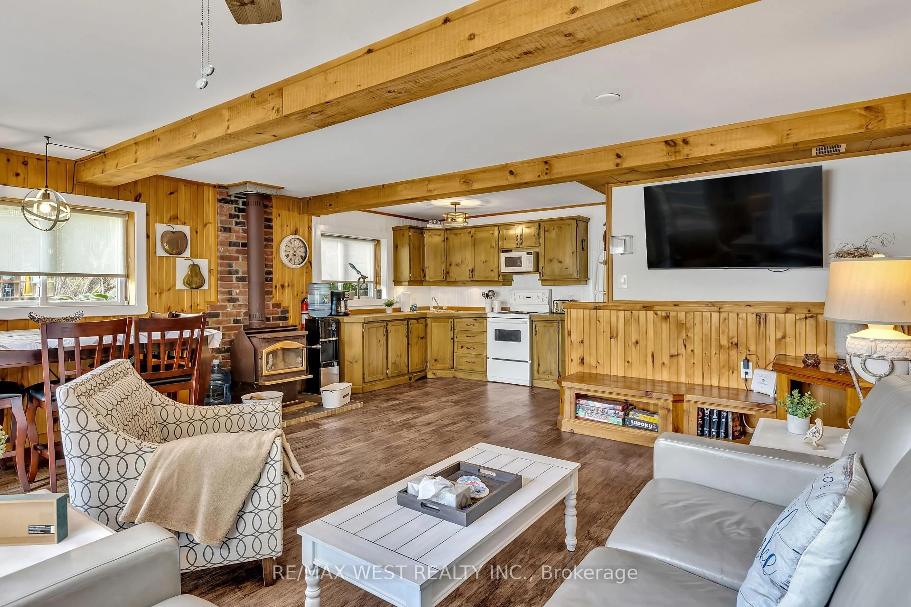 Living room with furniture, wood/laminate floor for 244 Fire Route 33, Havelock-Belmont-Methuen Ontario K0L 1Z0