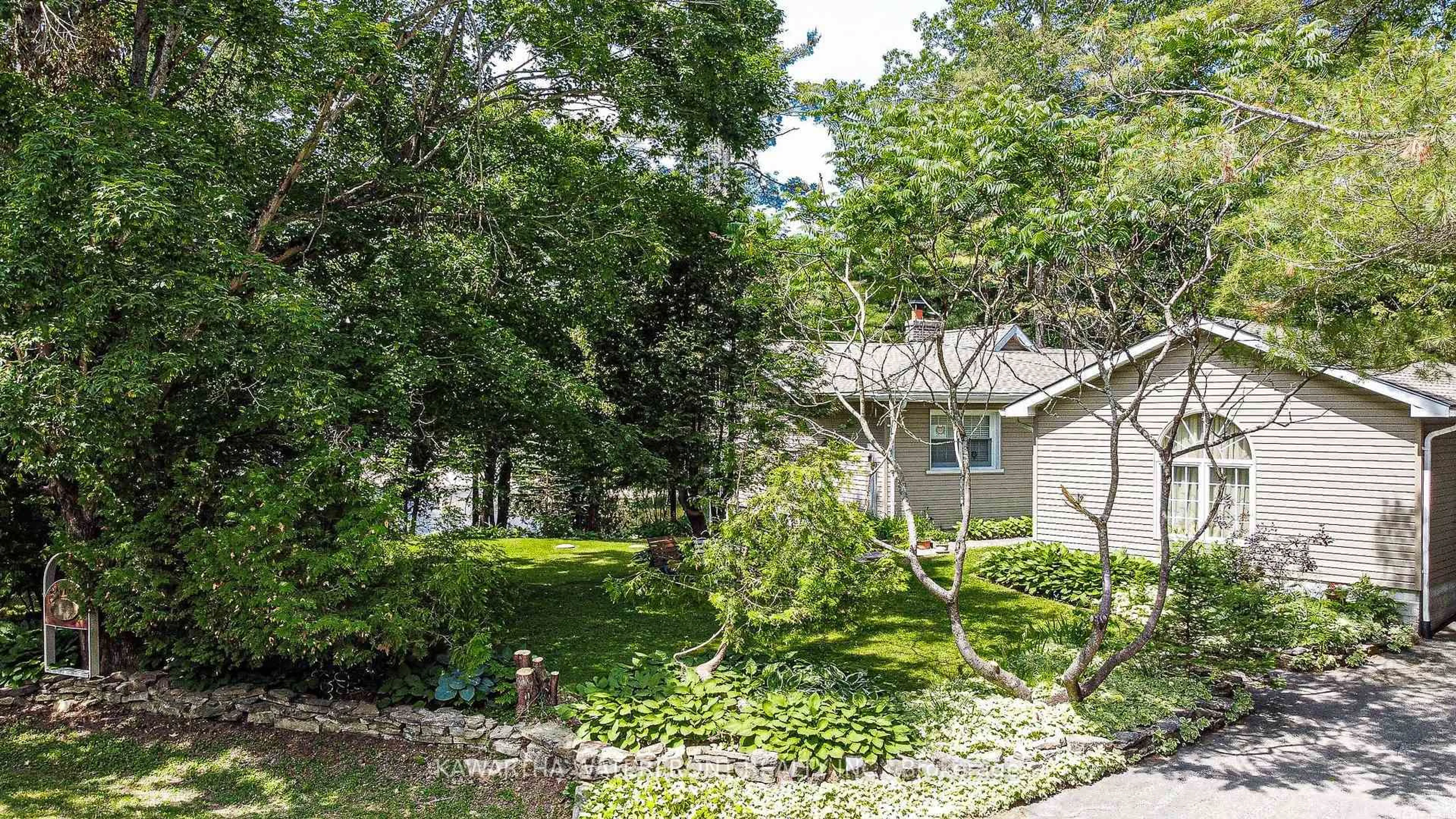 A pic from outside/outdoor area/front of a property/back of a property/a pic from drone, street for 25 Government Dock Rd, Kawartha Lakes Ontario K0M 2L0