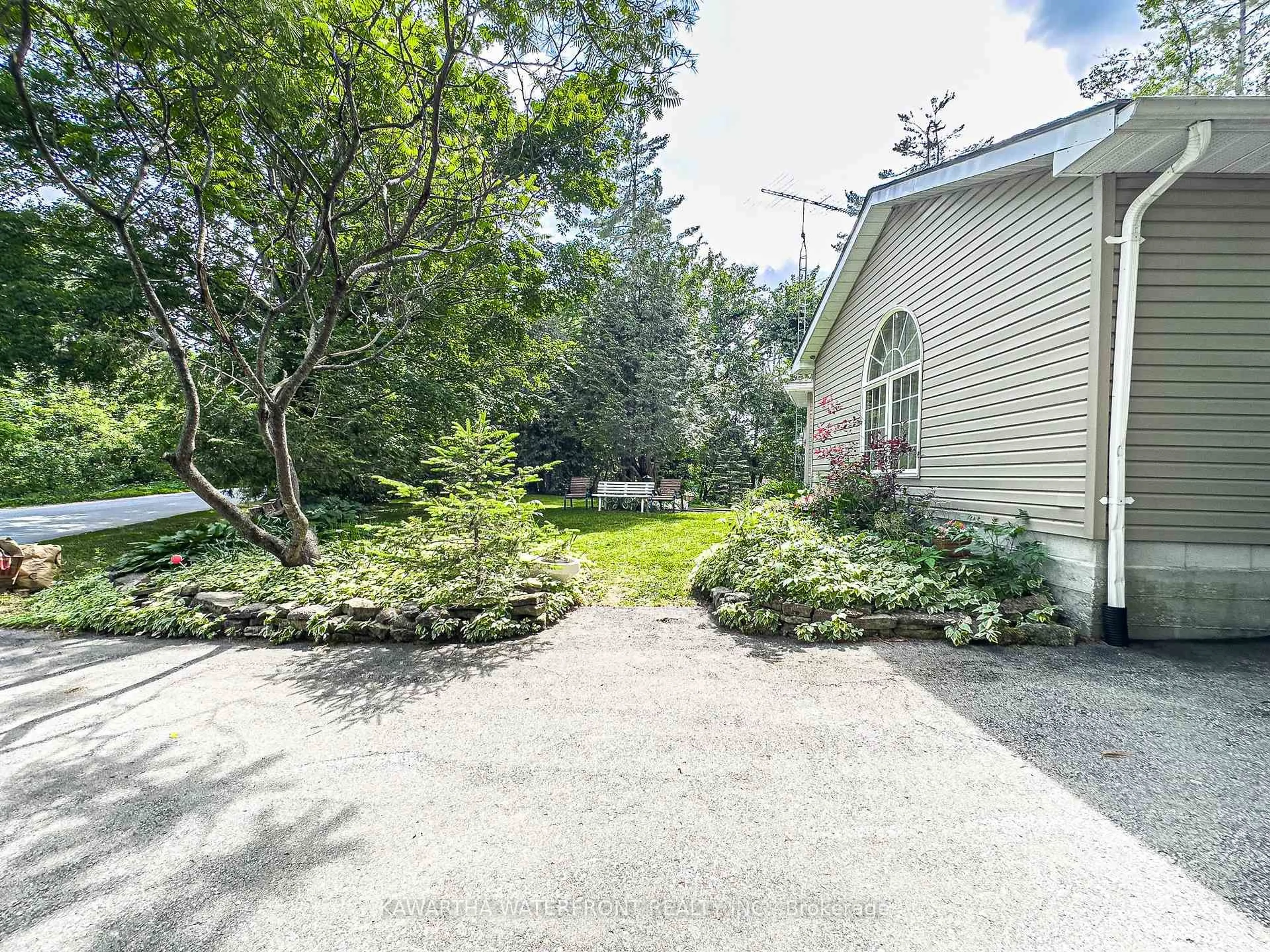 A pic from outside/outdoor area/front of a property/back of a property/a pic from drone, street for 25 Government Dock Rd, Kawartha Lakes Ontario K0M 2L0