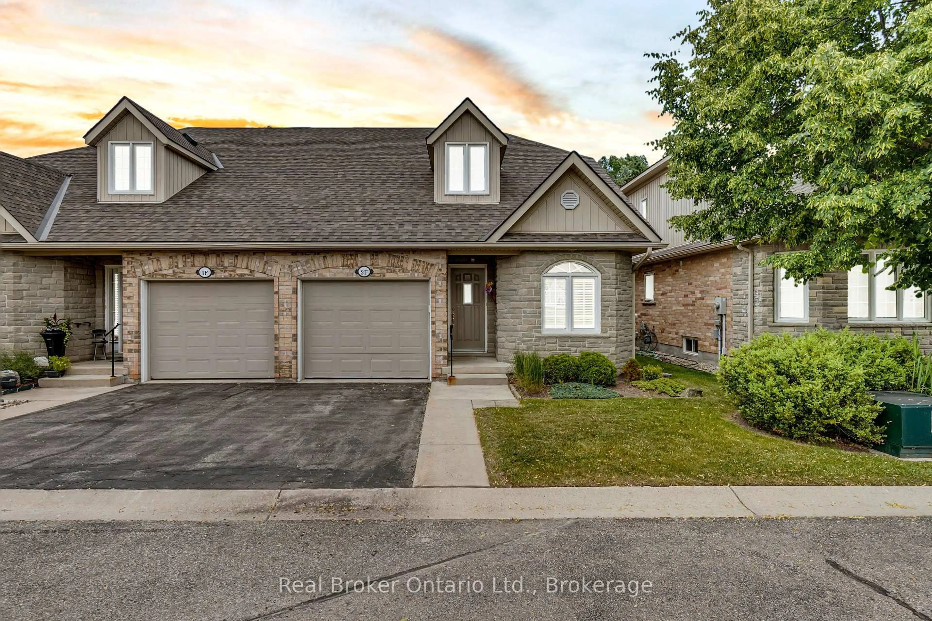 Home with brick exterior material, street for 350 Doon Valley Dr #002F, Kitchener Ontario N2P 2M9