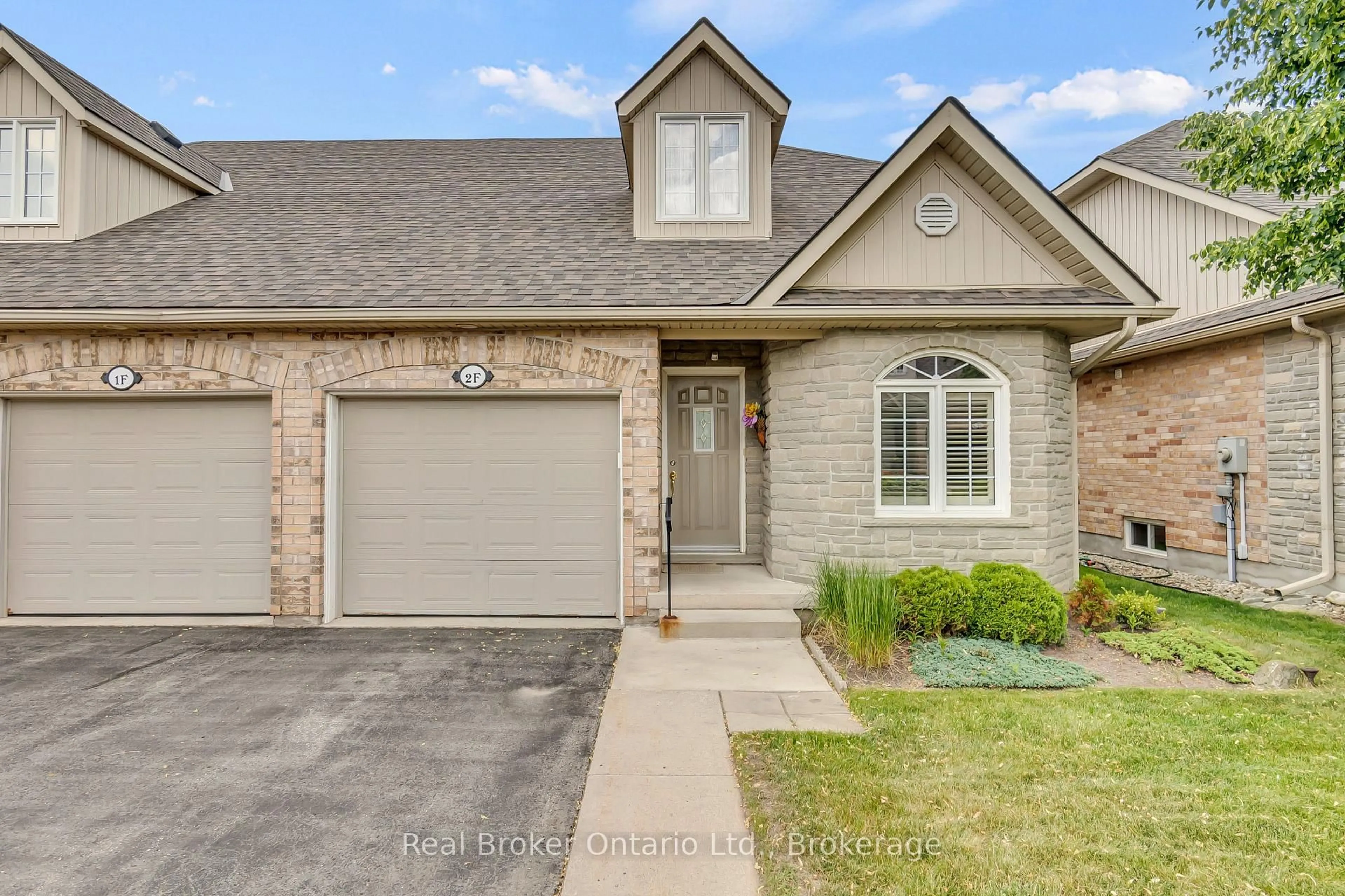 Home with brick exterior material, street for 350 Doon Valley Dr #002F, Kitchener Ontario N2P 2M9