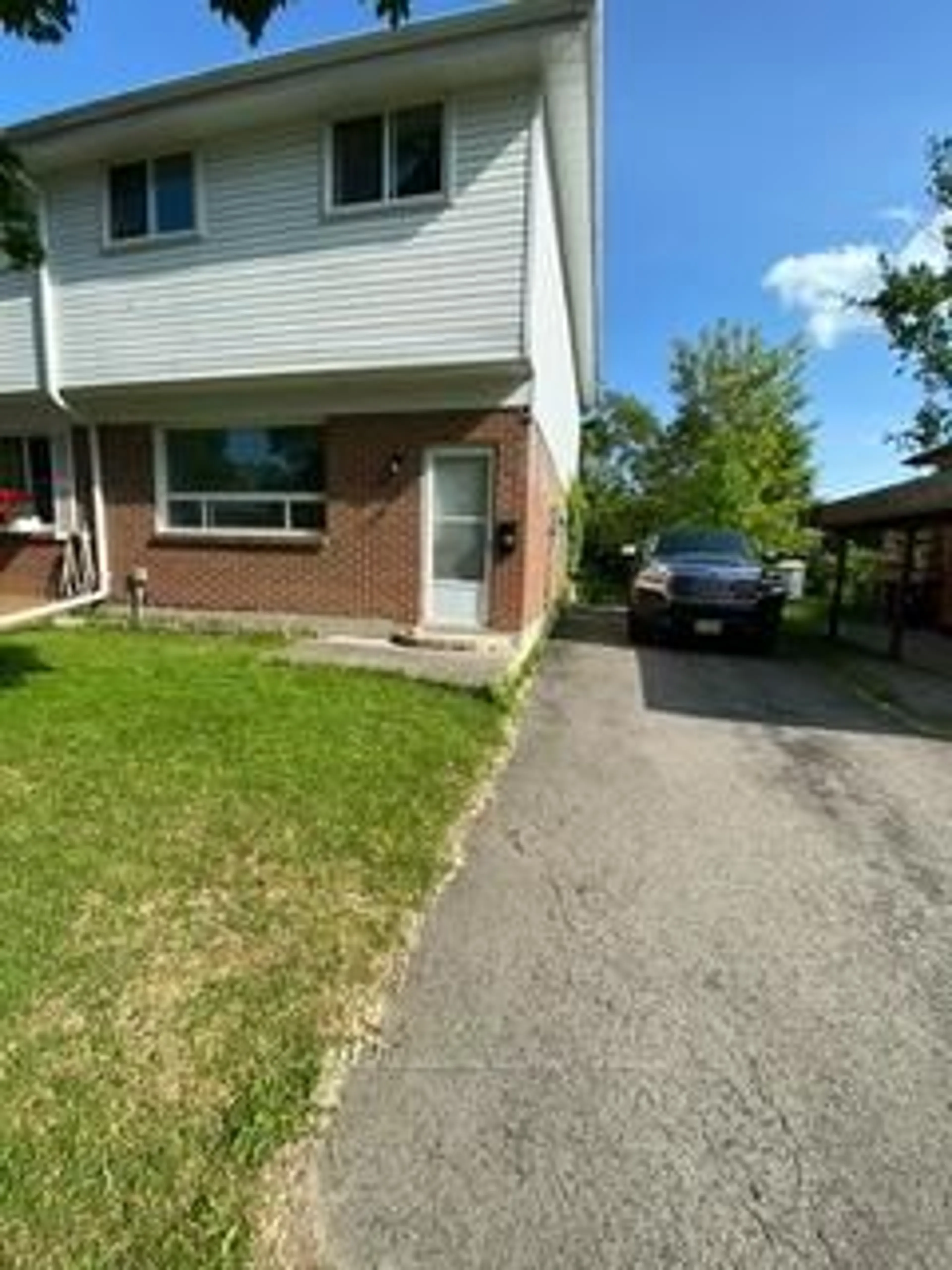 A pic from outside/outdoor area/front of a property/back of a property/a pic from drone, street for 24 Springbrook Dr #A, Peterborough West Ontario K9J 1L1