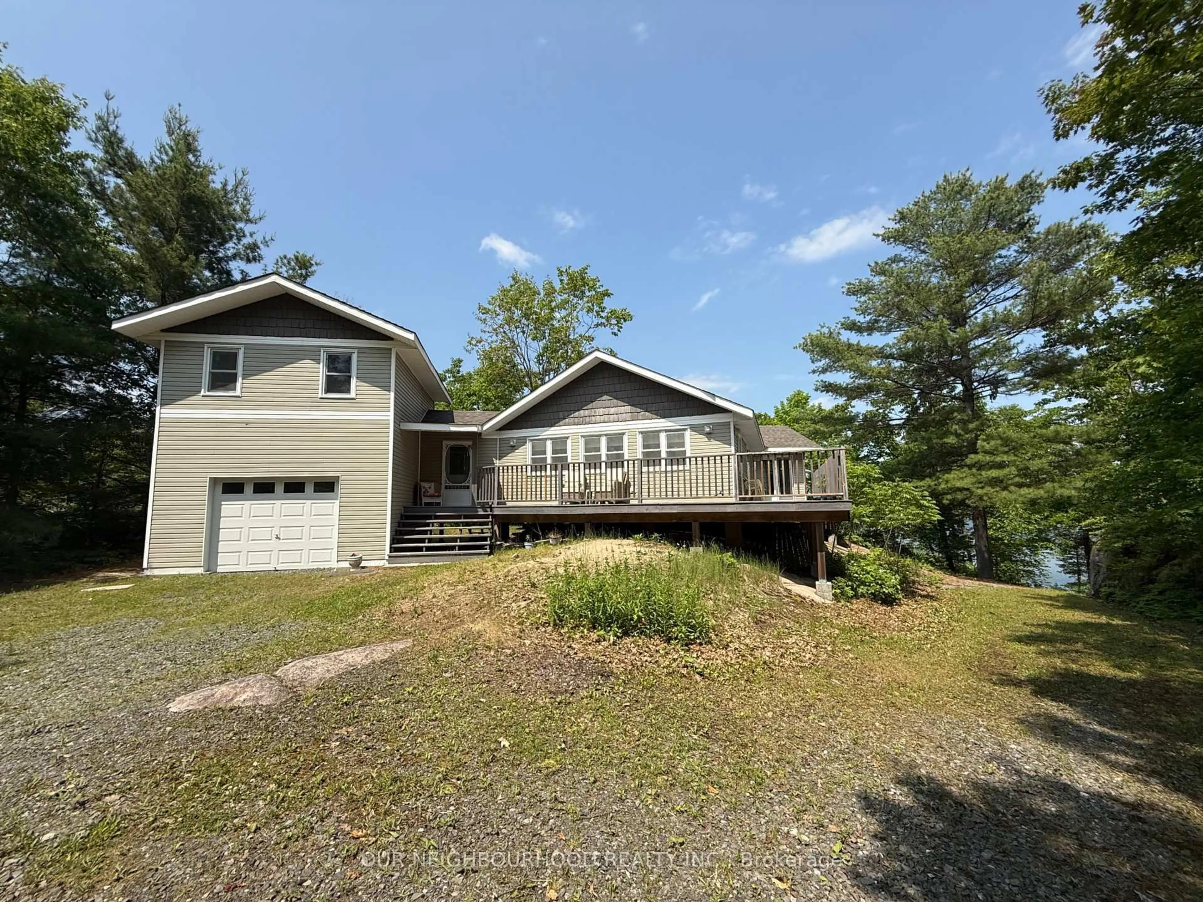 A pic from outside/outdoor area/front of a property/back of a property/a pic from drone, water/lake/river/ocean view for 492 Yarrow Lane Lane, Madoc Ontario K0K 2K0