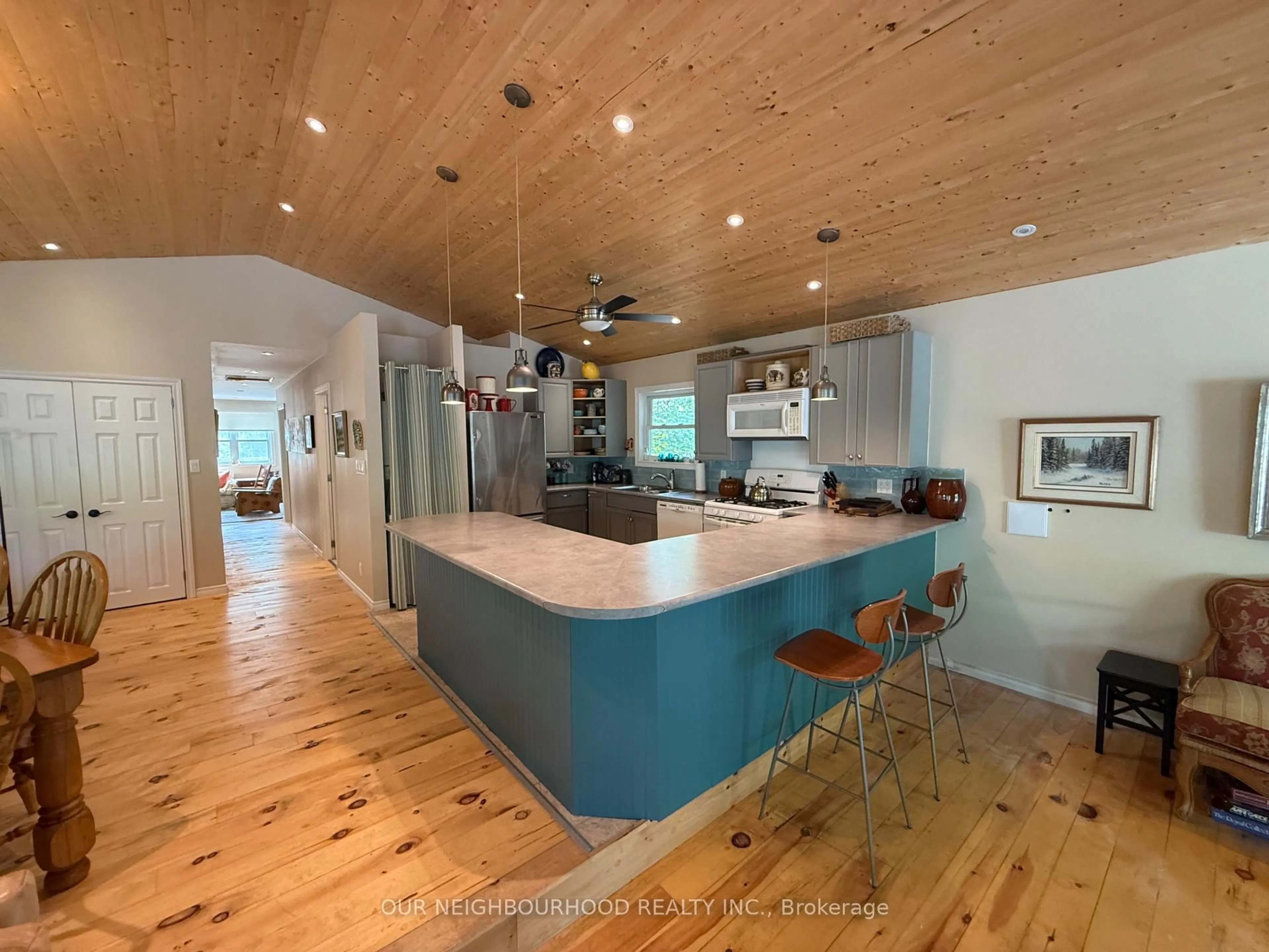 Open concept kitchen, wood/laminate floor for 492 Yarrow Lane Lane, Madoc Ontario K0K 2K0