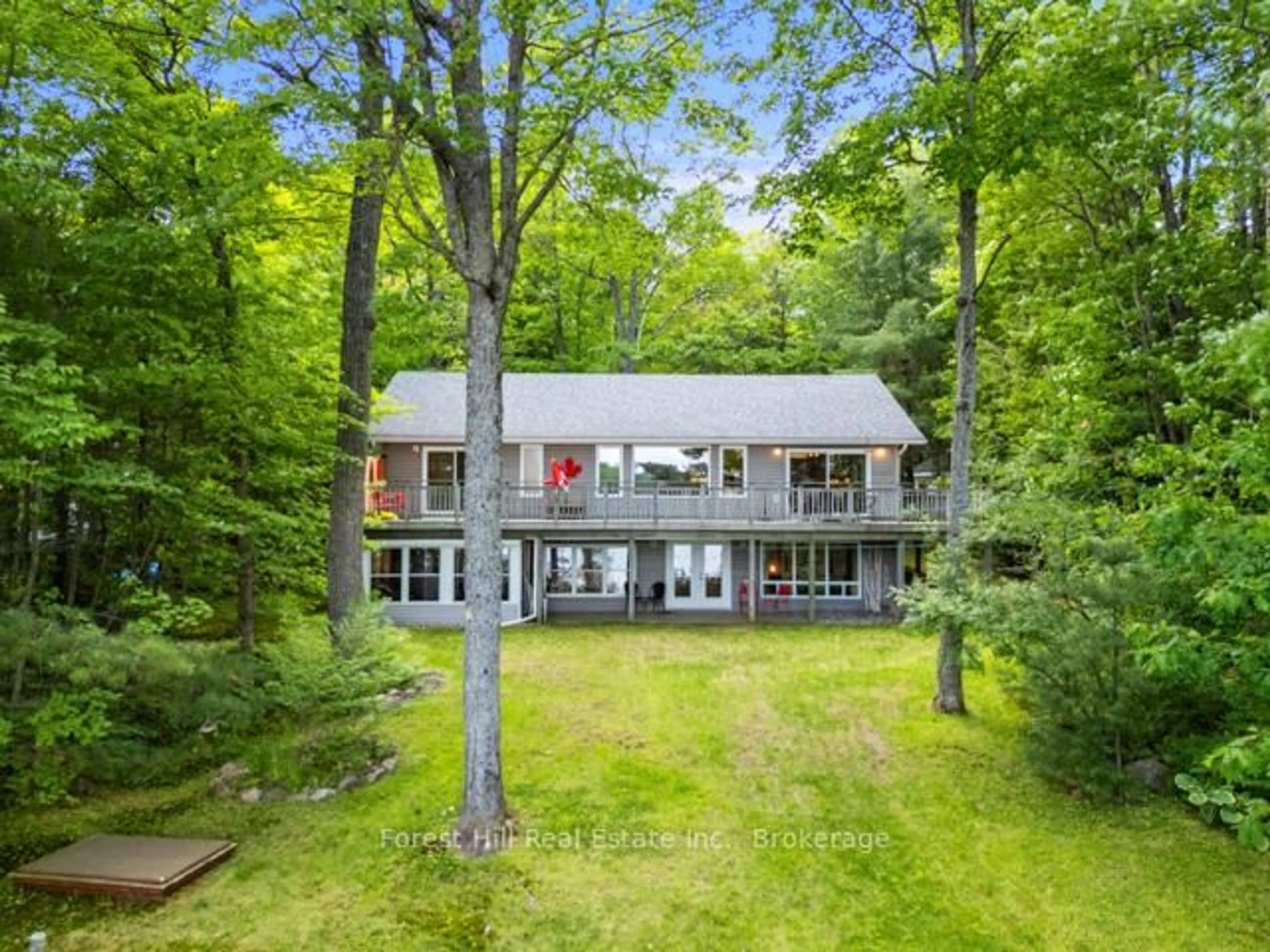 A pic from outside/outdoor area/front of a property/back of a property/a pic from drone, water/lake/river/ocean view for 1137 Dickie Lake Rd, Lake of Bays Ontario P0B 1E0