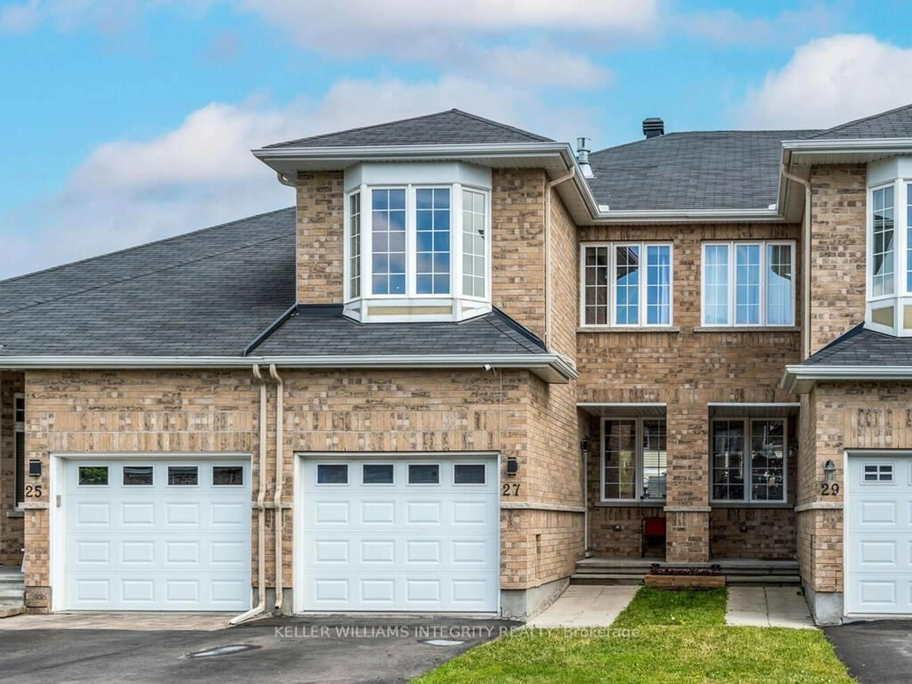 Home with brick exterior material, street for 27 Desmond Trudeau Dr, Stittsville Ontario K2S 0G5